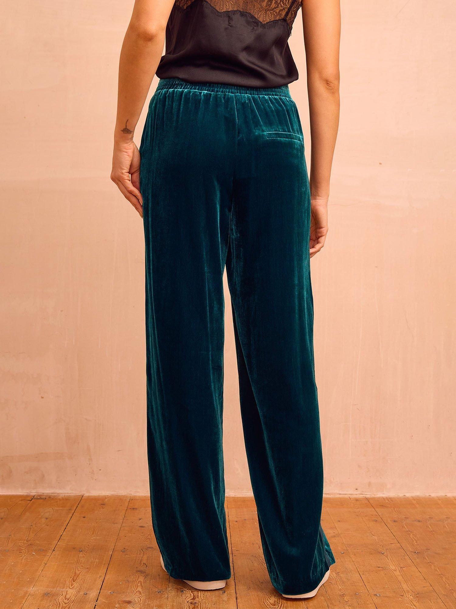 Product image 4 of 6, which shows Aspiga Velvet Side Stripe Trousers, Teal, XS