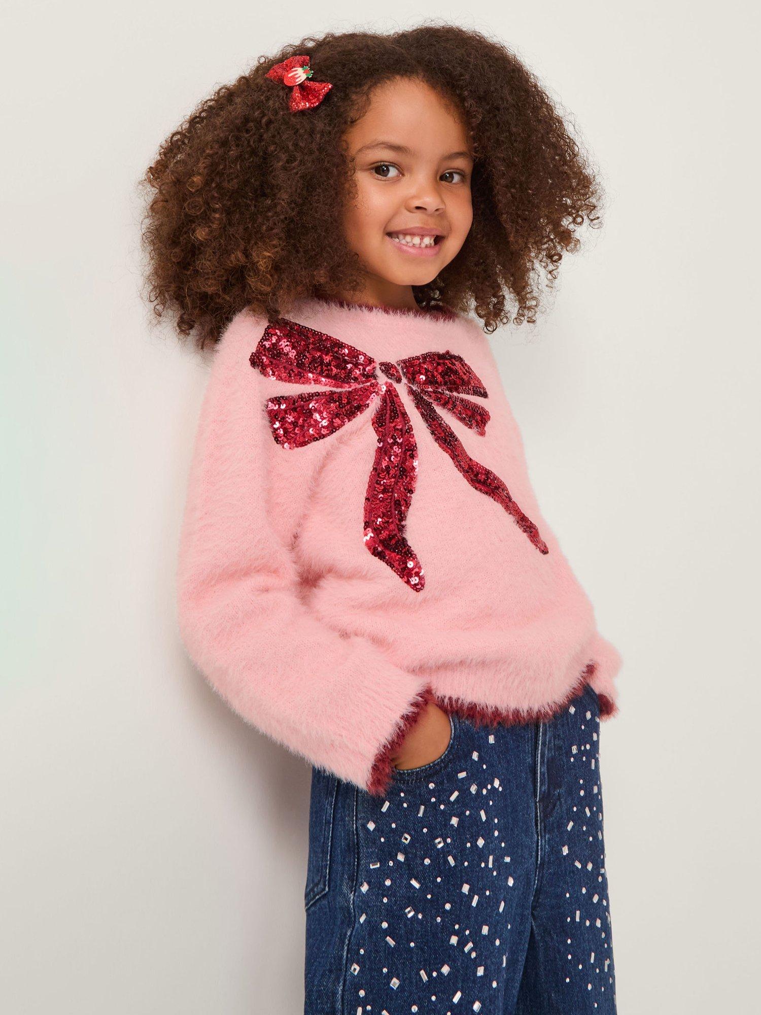 Product image 1 of 4, which shows Monsoon Kids' Sequin Bow Fuzzy Jumper, Pink, 5-6 years