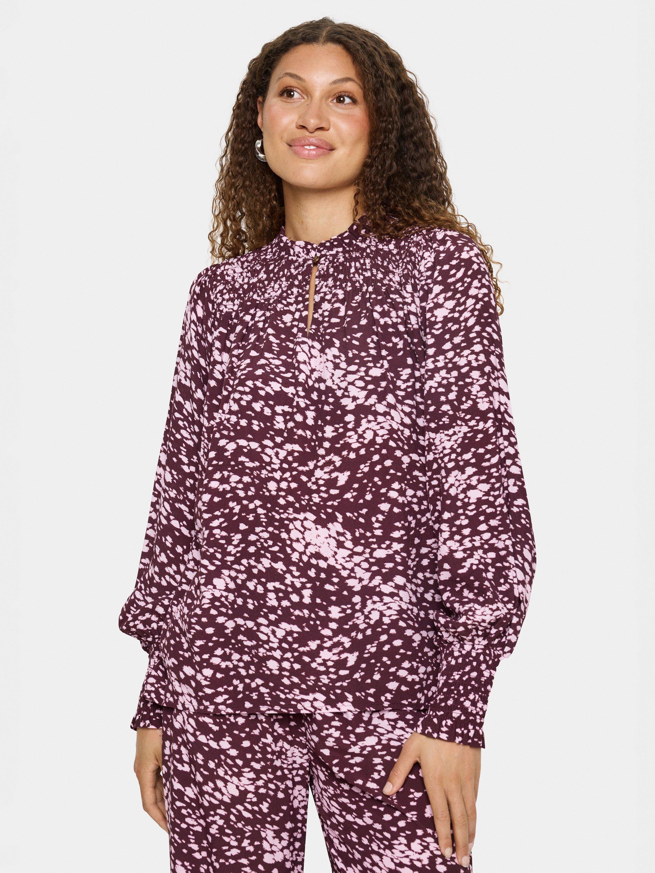 Product image 1 of 6, which shows Saint Tropez Malika Abstract Animal Print Top, Fudge, M