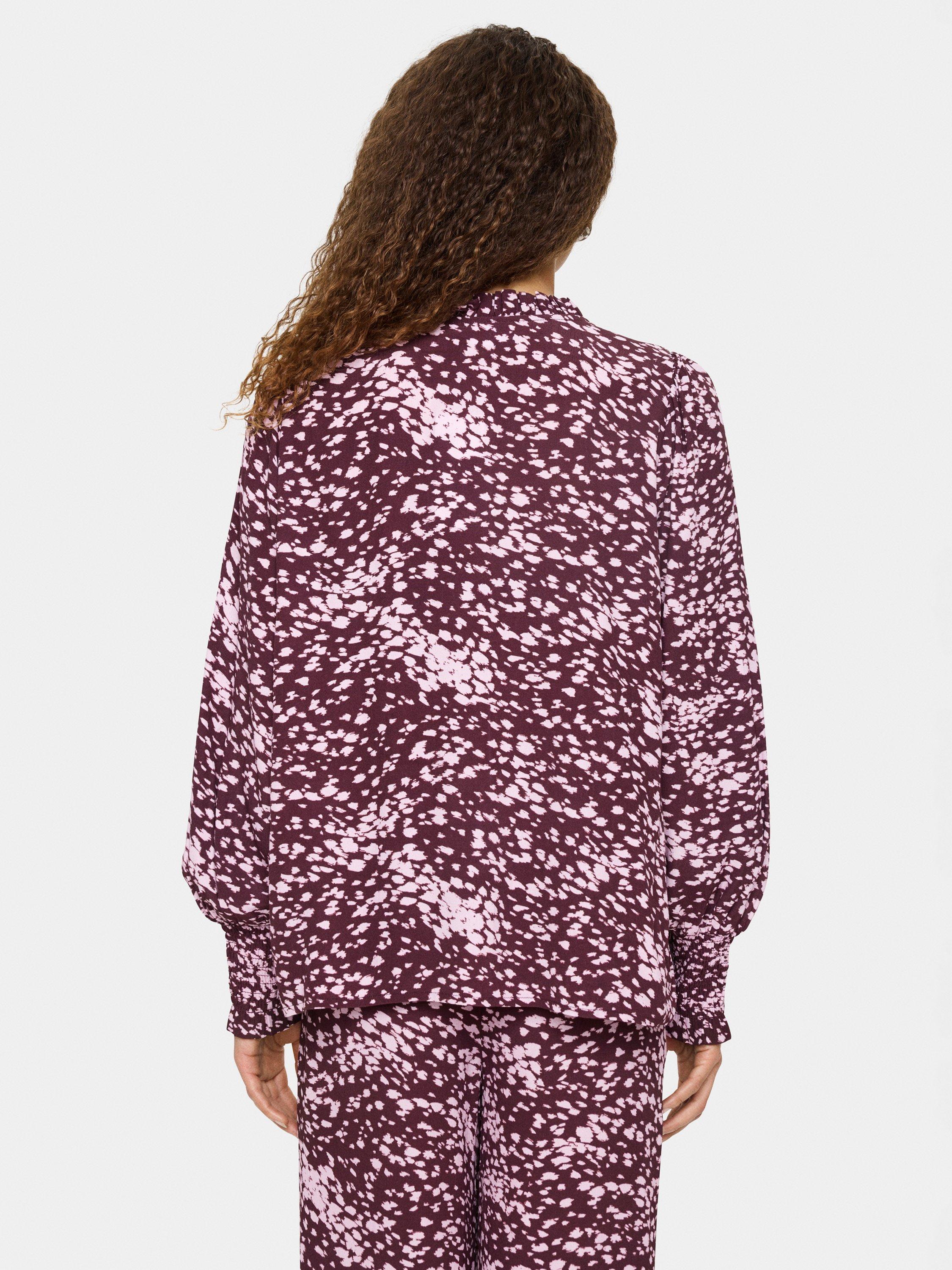 Product image 2 of 6, which shows Saint Tropez Malika Abstract Animal Print Top, Fudge, M