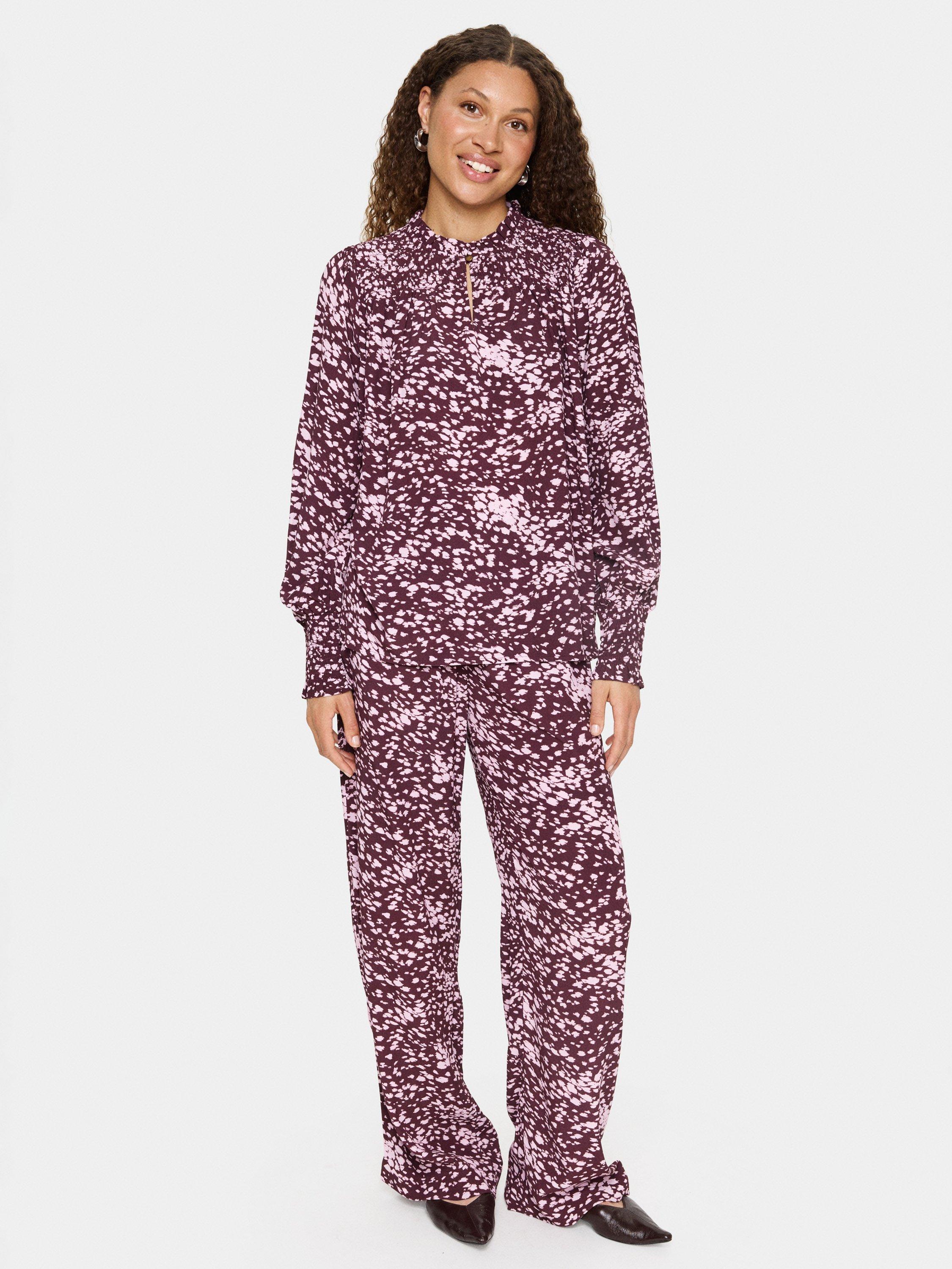 Product image 3 of 6, which shows Saint Tropez Malika Abstract Animal Print Top, Fudge, M