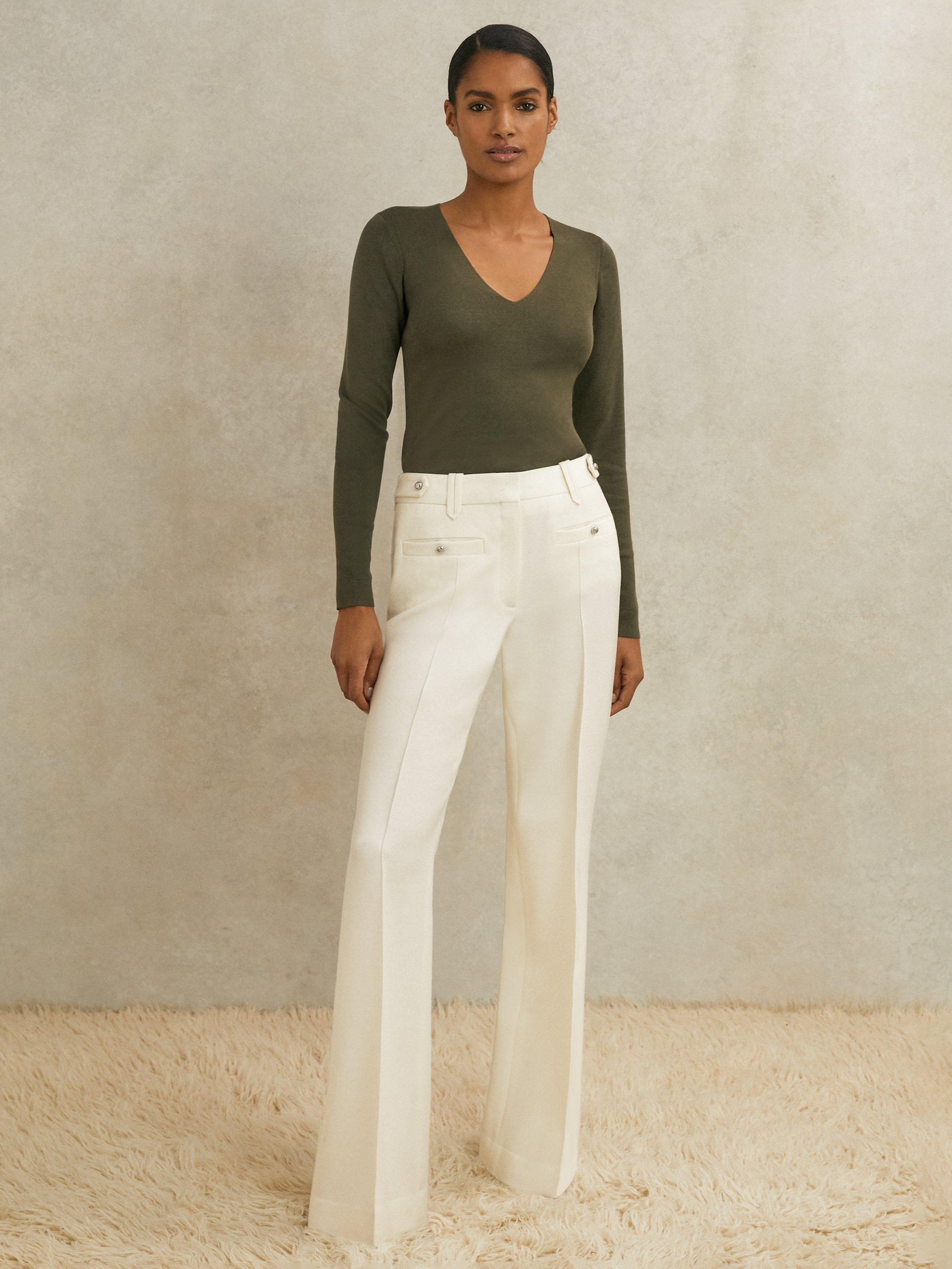 Product image 1 of 5, which shows Reiss Atelier Athena Stud Flared Pure Wool Trousers, White, 6