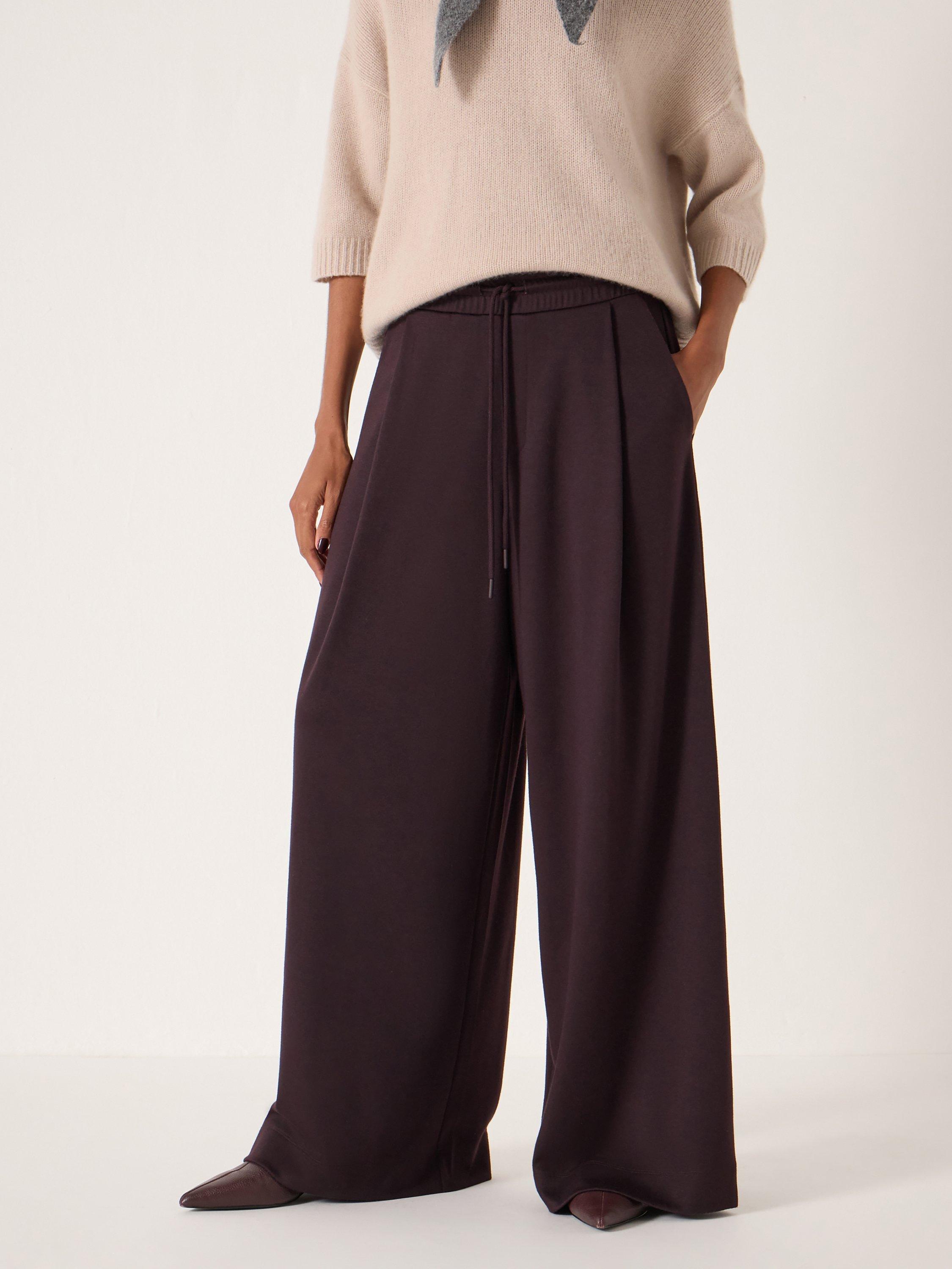 Product image 1 of 5, which shows HUSH Taylor Wide Leg Trousers, Dark Plum Purple, L-XL