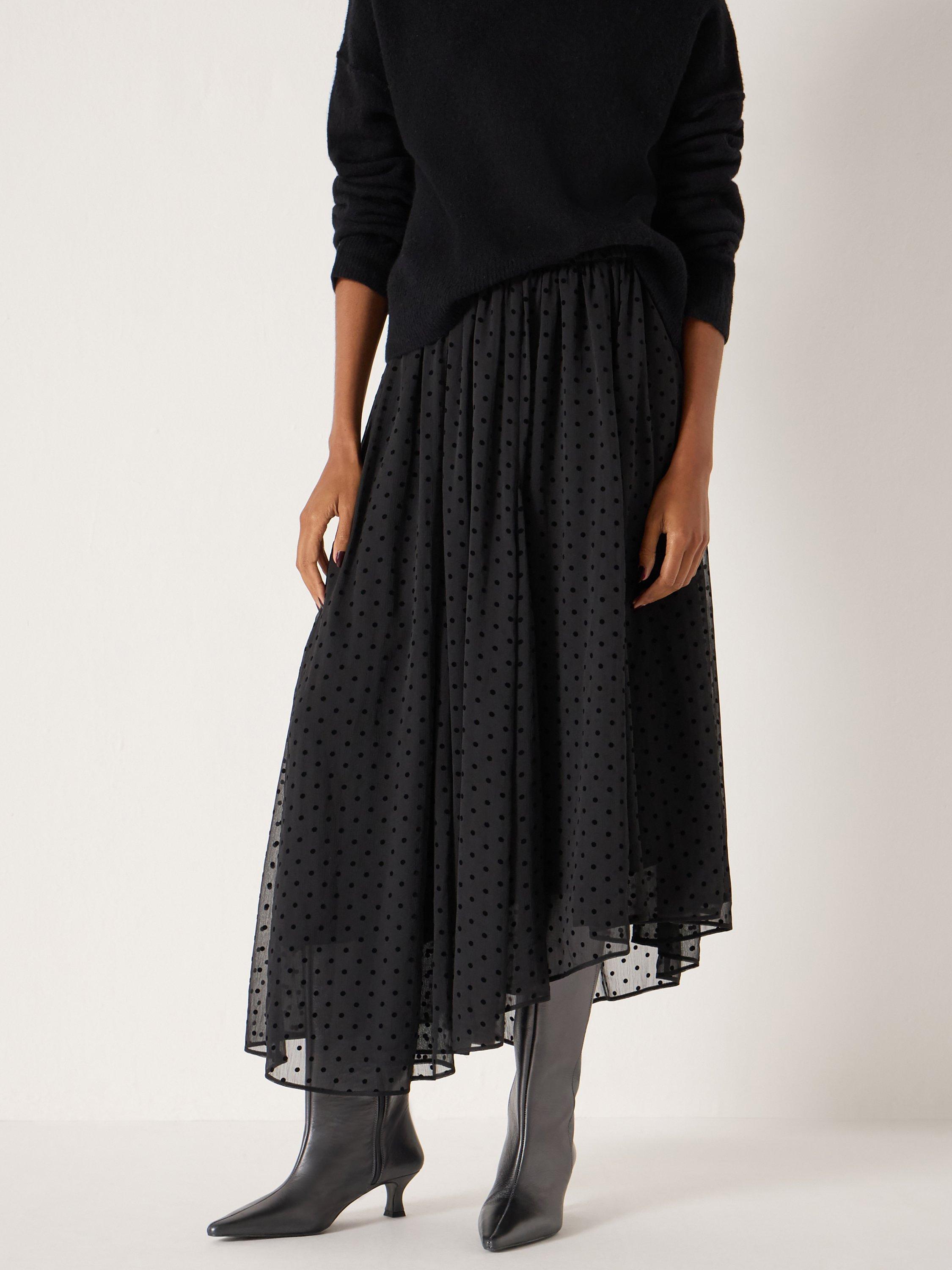 Product image 1 of 5, which shows HUSH Asymmetric Polka Dot Midi Skirt, Black, L