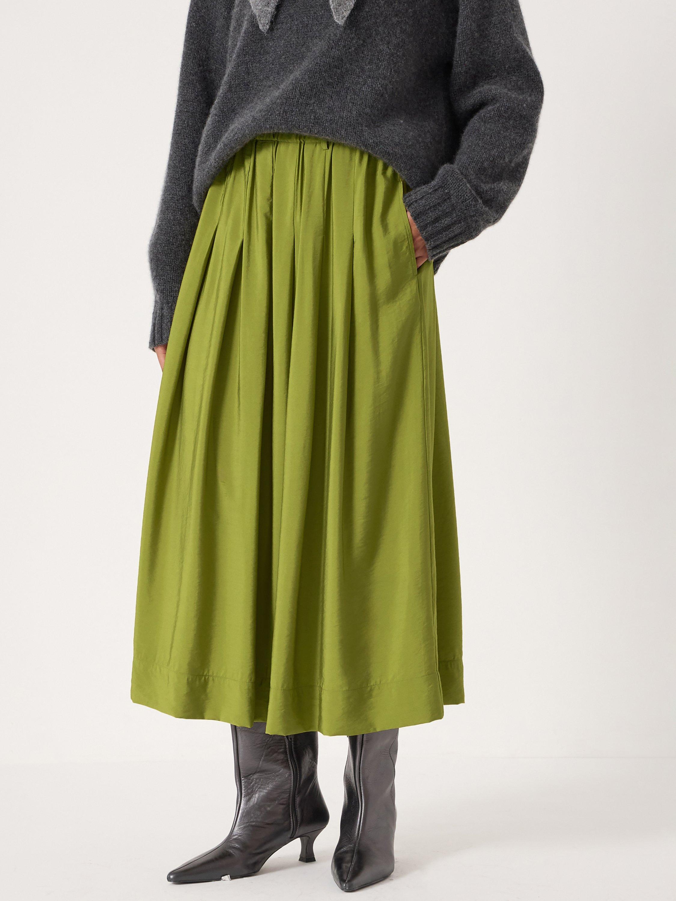 Product image 1 of 4, which shows HUSH Ivy Airflow Pleated Midi Skirt, Olive Green, XXS