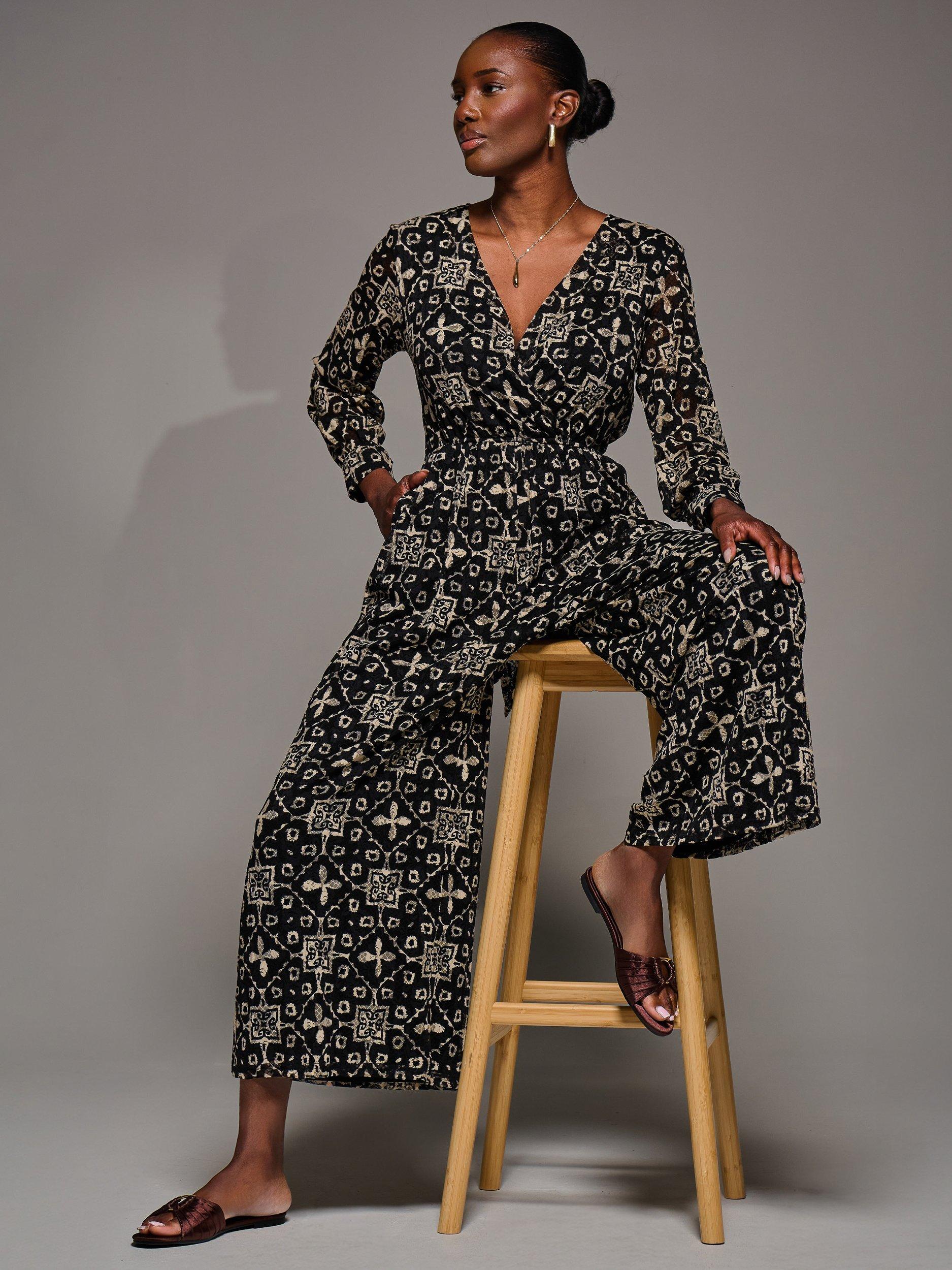 Product image 1 of 7, which shows Jolie Moi Geometric Wrap Tie Waist Jumpsuit, Black/Multi, 8