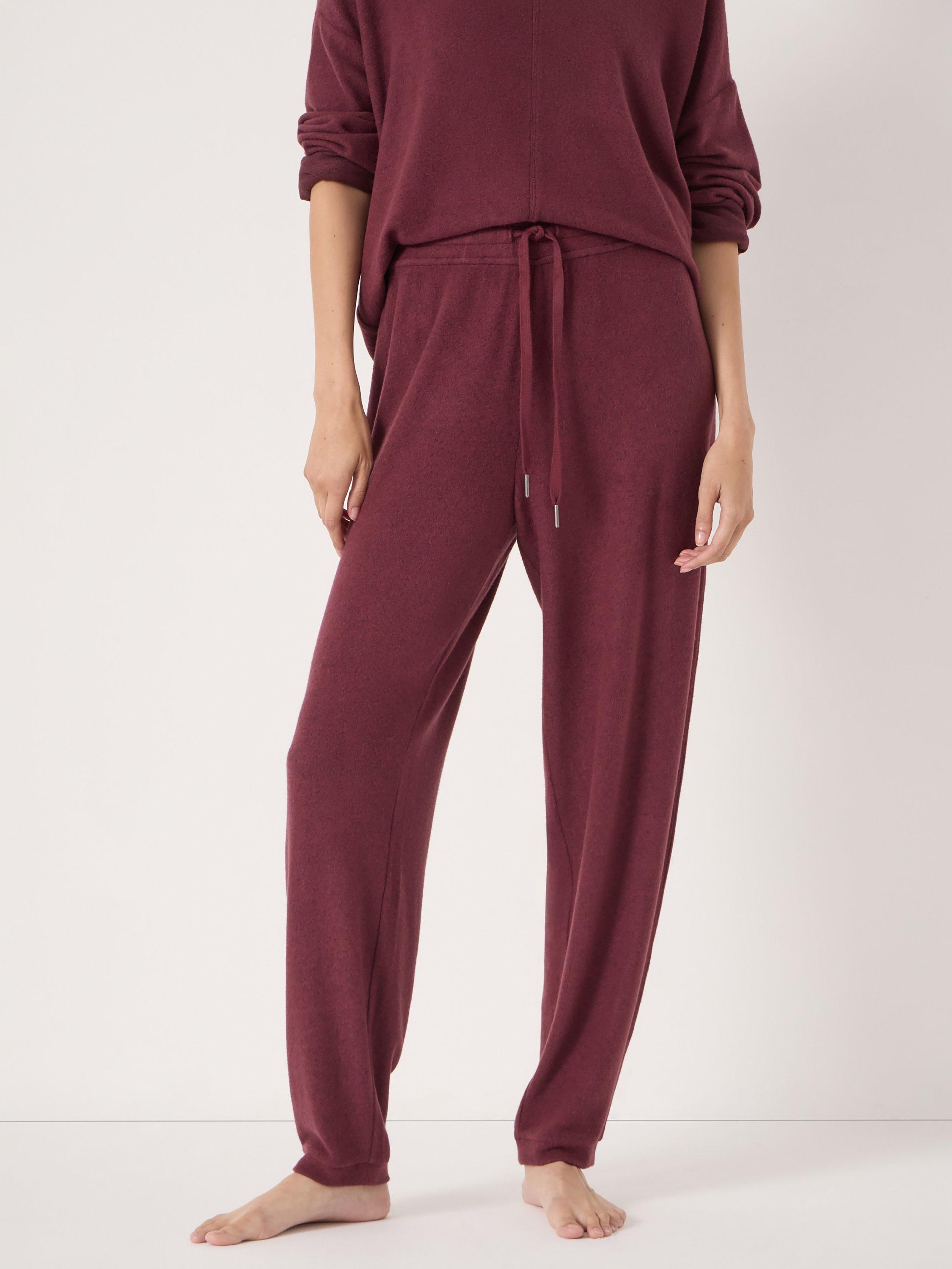 Product image 1 of 4, which shows HUSH Elle Soft Joggers containing LENZING™ ECOVERO™ Viscose, Burgundy Purple, L