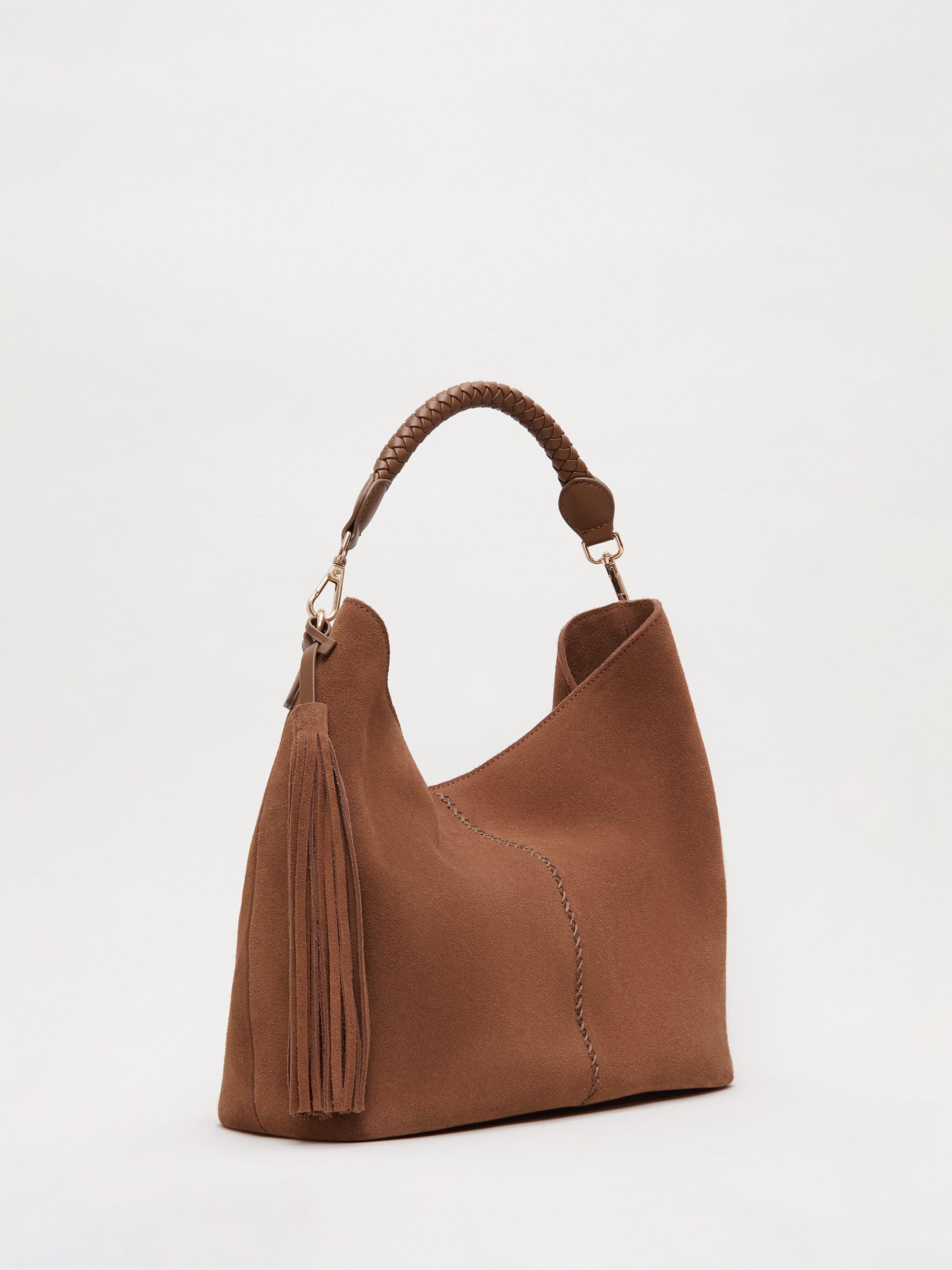 Product image 2 of 7, which shows Phase Eight Tassel Detail Pure Suede Bag, Tan, One Size