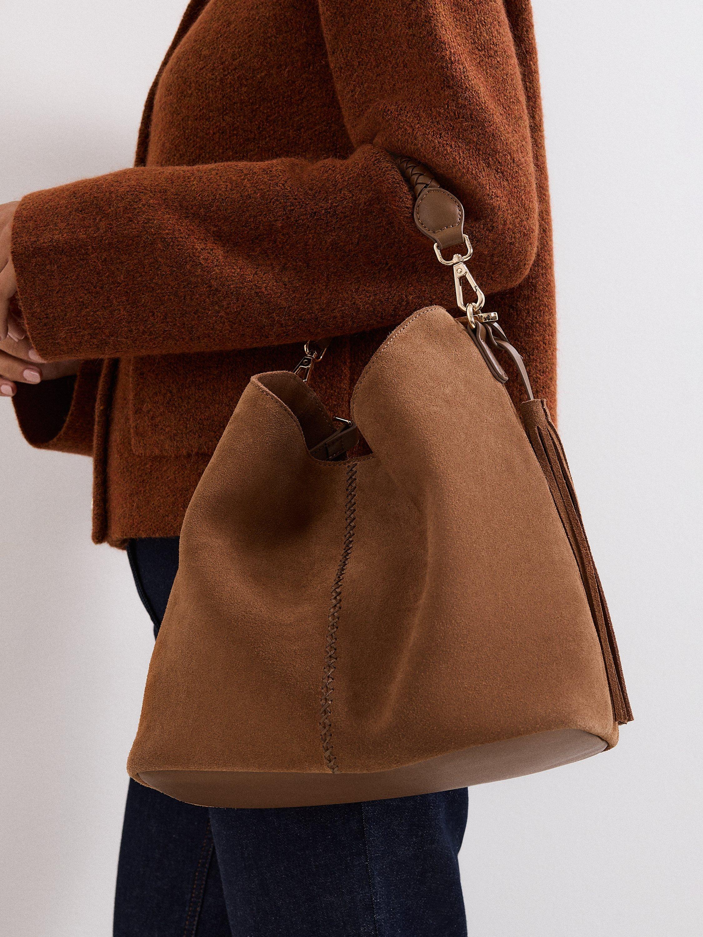 Product image 5 of 7, which shows Phase Eight Tassel Detail Pure Suede Bag, Tan, One Size