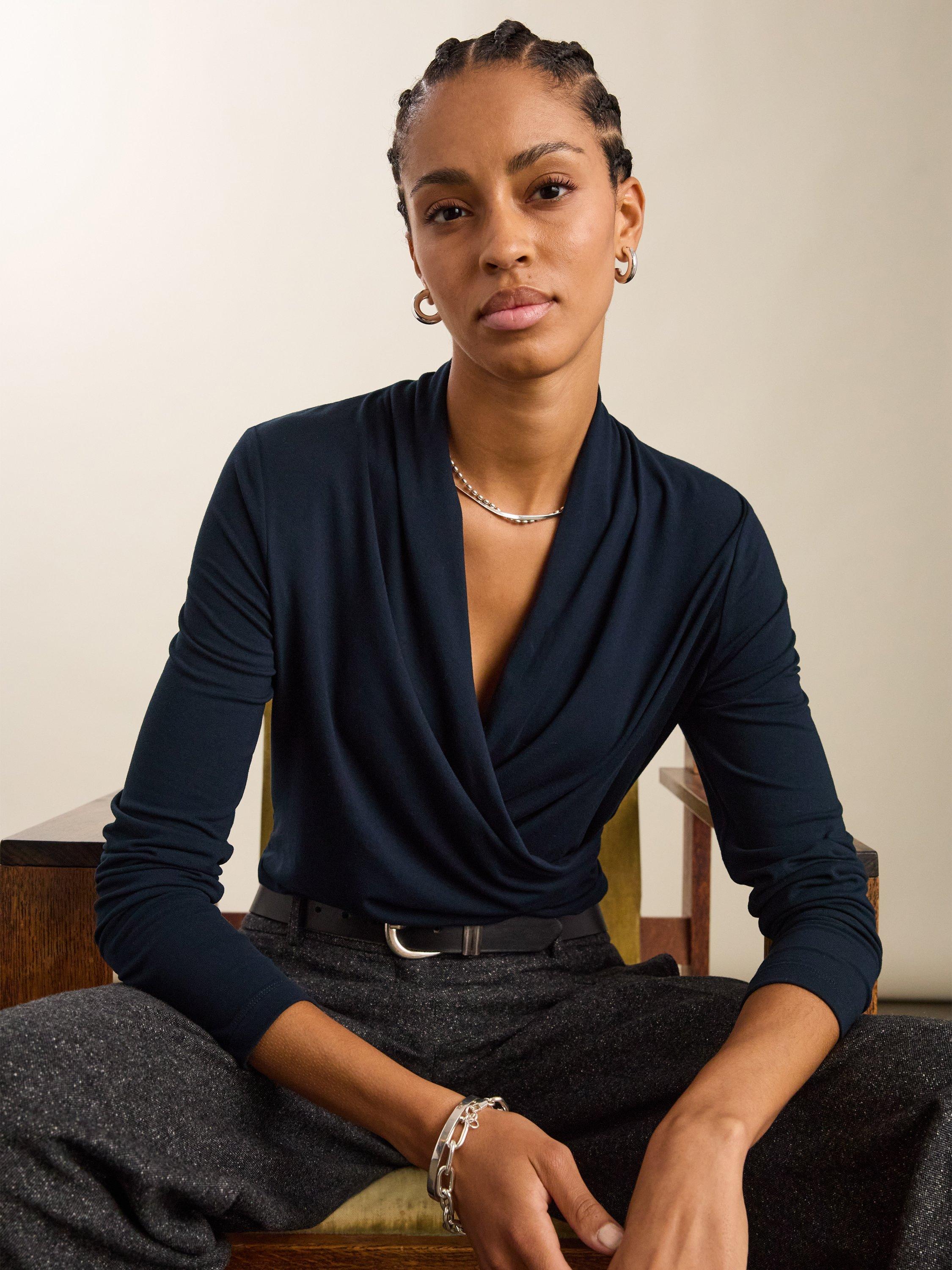 Product image 2 of 3, which shows Baukjen Gylda Wrap Top containing LENZING™ ECOVERO™ Viscose, Classic Navy, 10