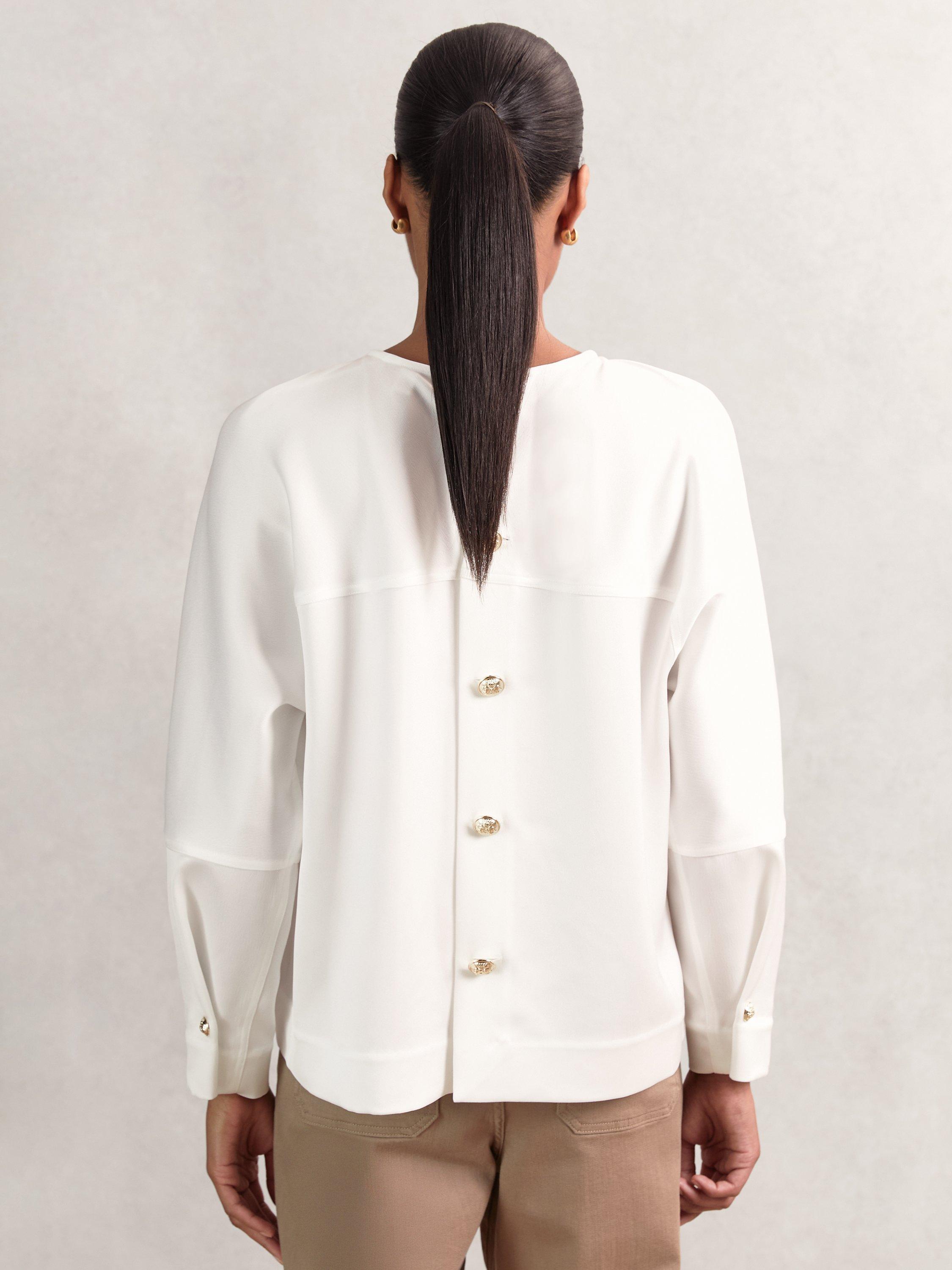 Product image 2 of 5, which shows Reiss Natalia Long Sleeve Button Back Top, Ivory, 8
