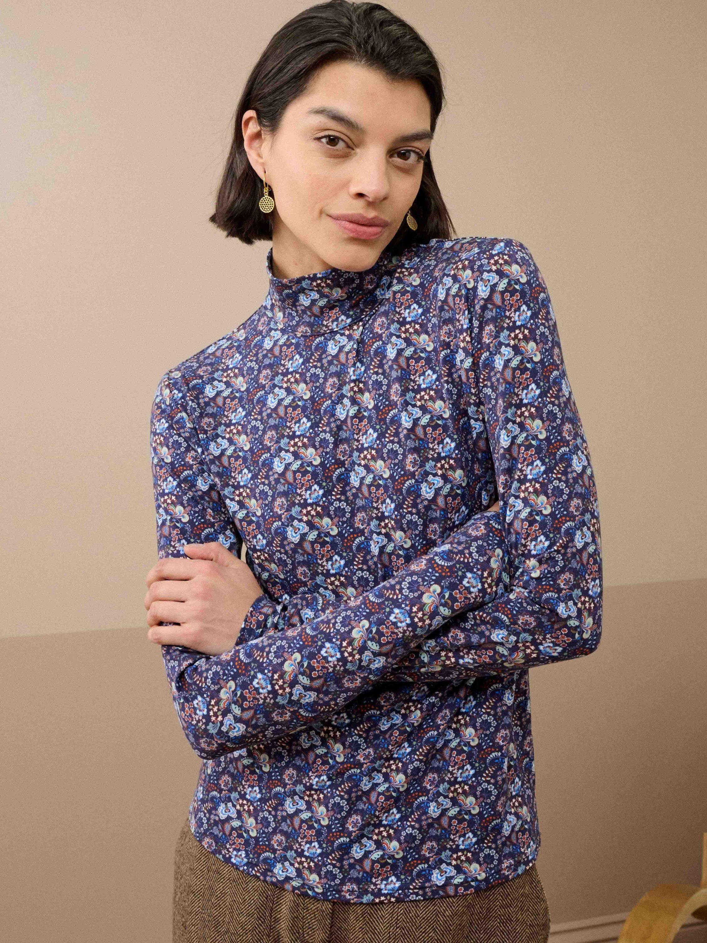 Product image 1 of 5, which shows Brora Floral Long Sleeve Polo Neck Jersey Top, Navy/Multi, 6