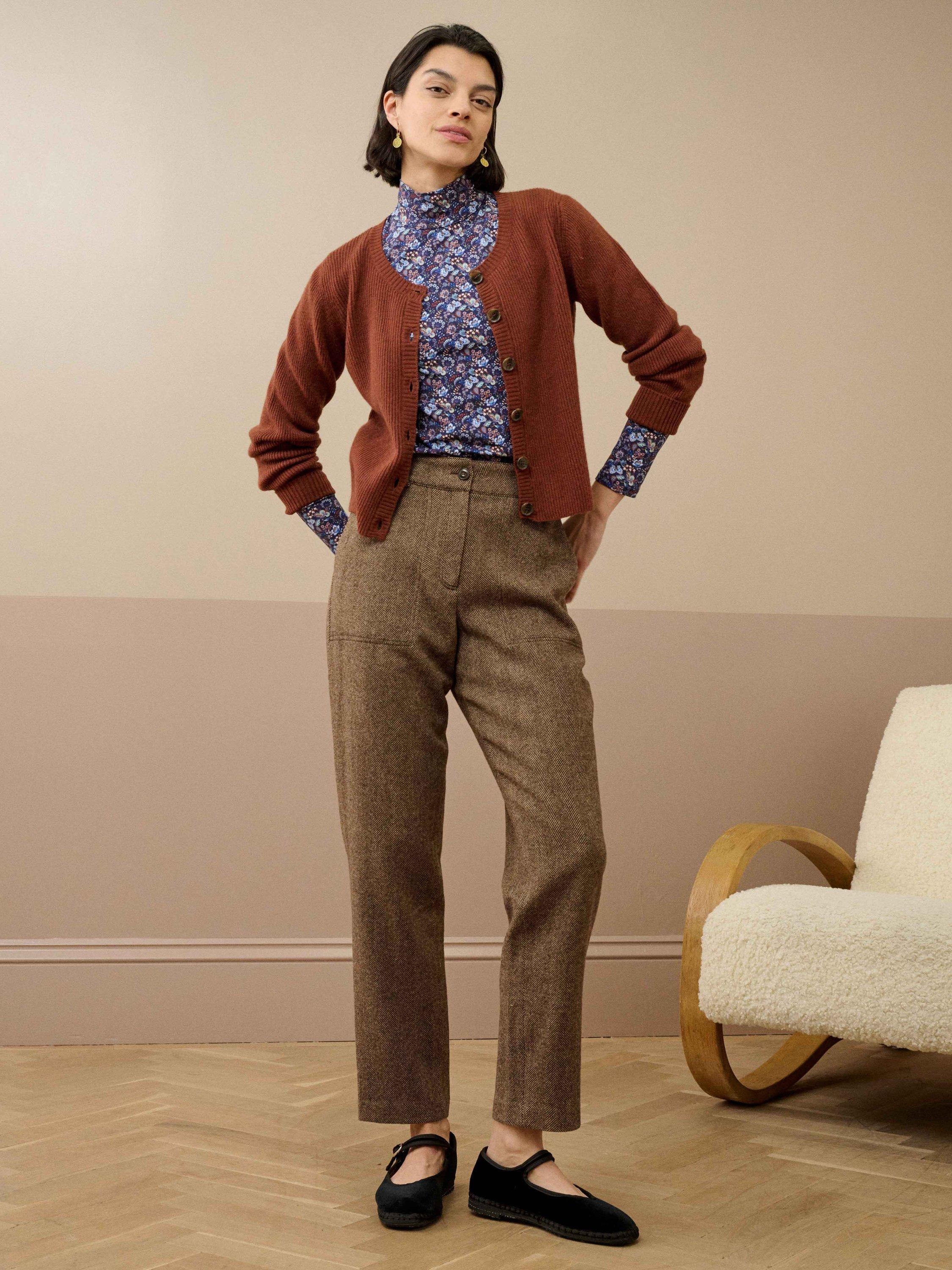 Product image 2 of 5, which shows Brora Floral Long Sleeve Polo Neck Jersey Top, Navy/Multi, 6