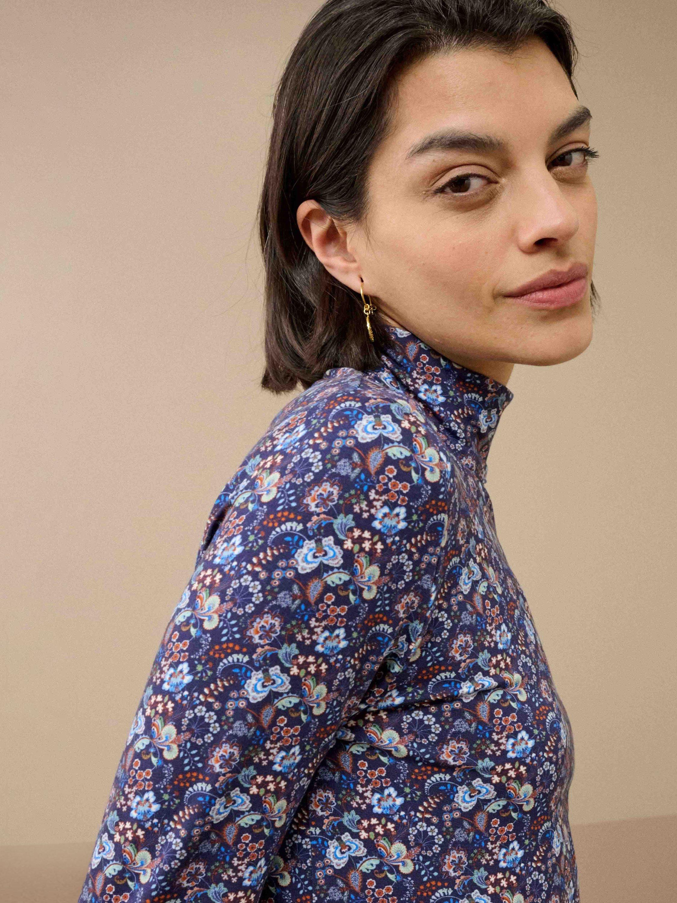 Product image 4 of 5, which shows Brora Floral Long Sleeve Polo Neck Jersey Top, Navy/Multi, 6