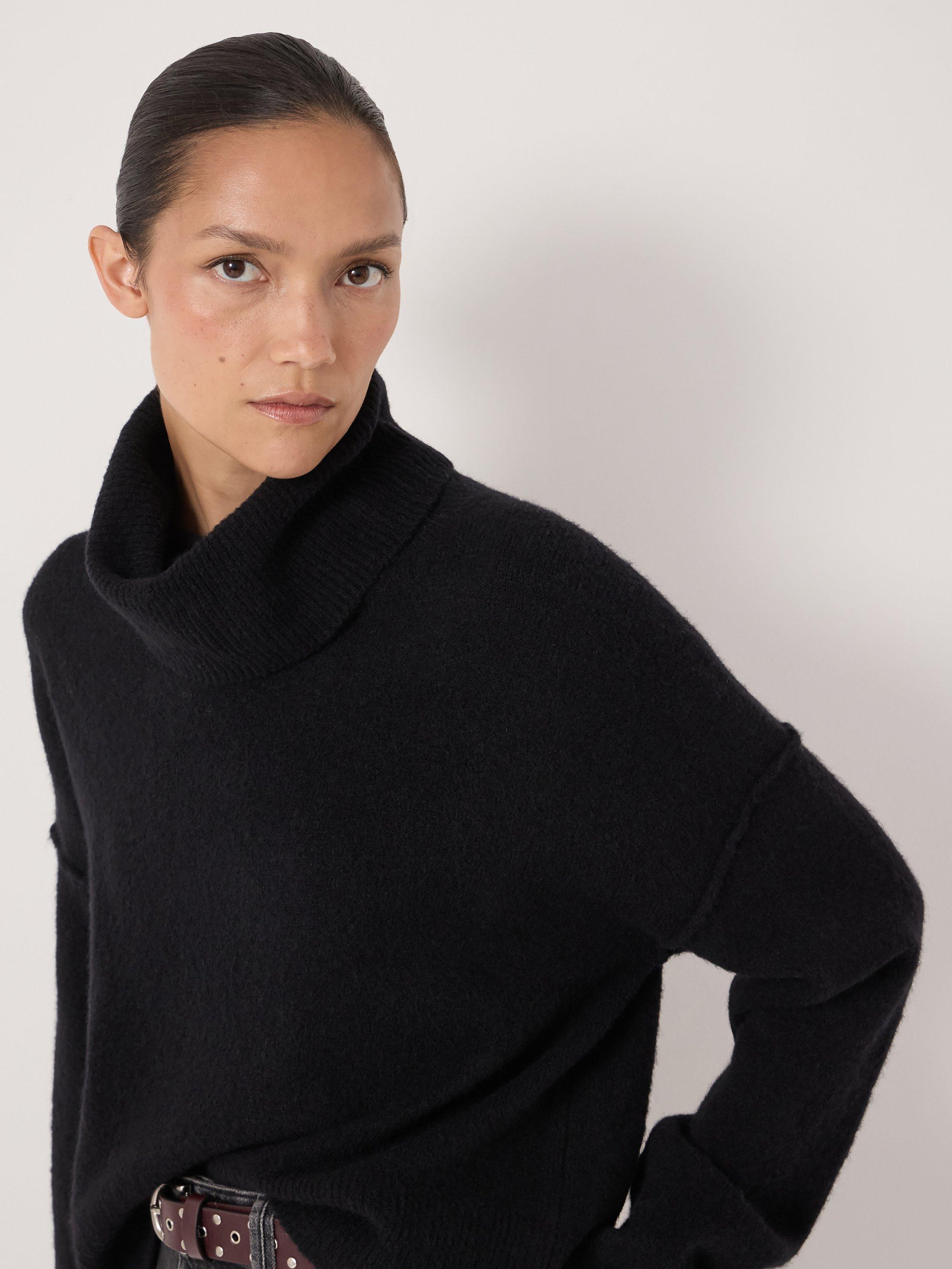 Product image 5 of 6, which shows HUSH Meryl Wool Blend Drop Sleeve Roll Neck Crop Jumper, Black, L-XL