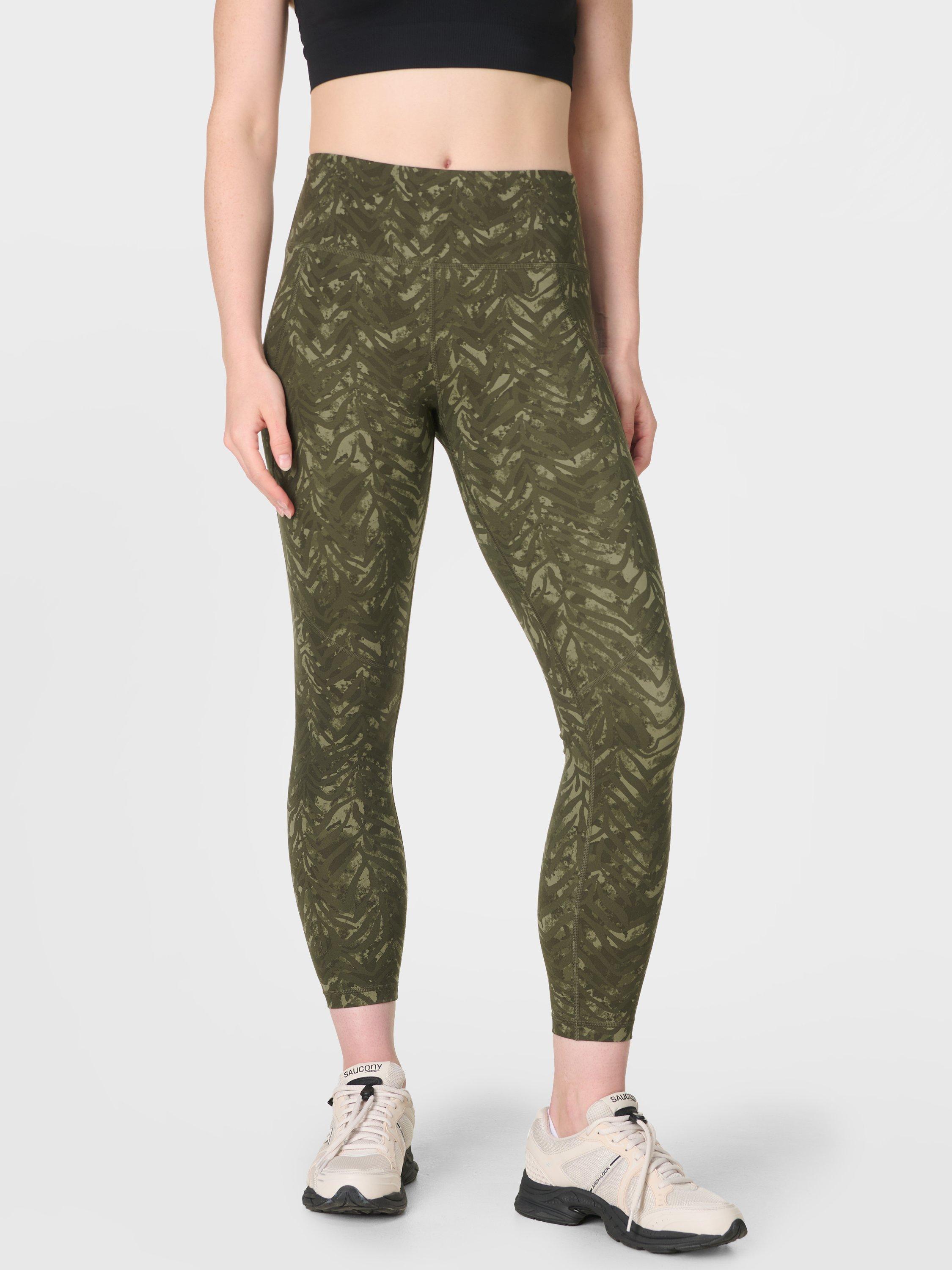 Product image 1 of 8, which shows Sweaty Betty Power 7/8 Workout Leggings, Green Animal Texture, XS