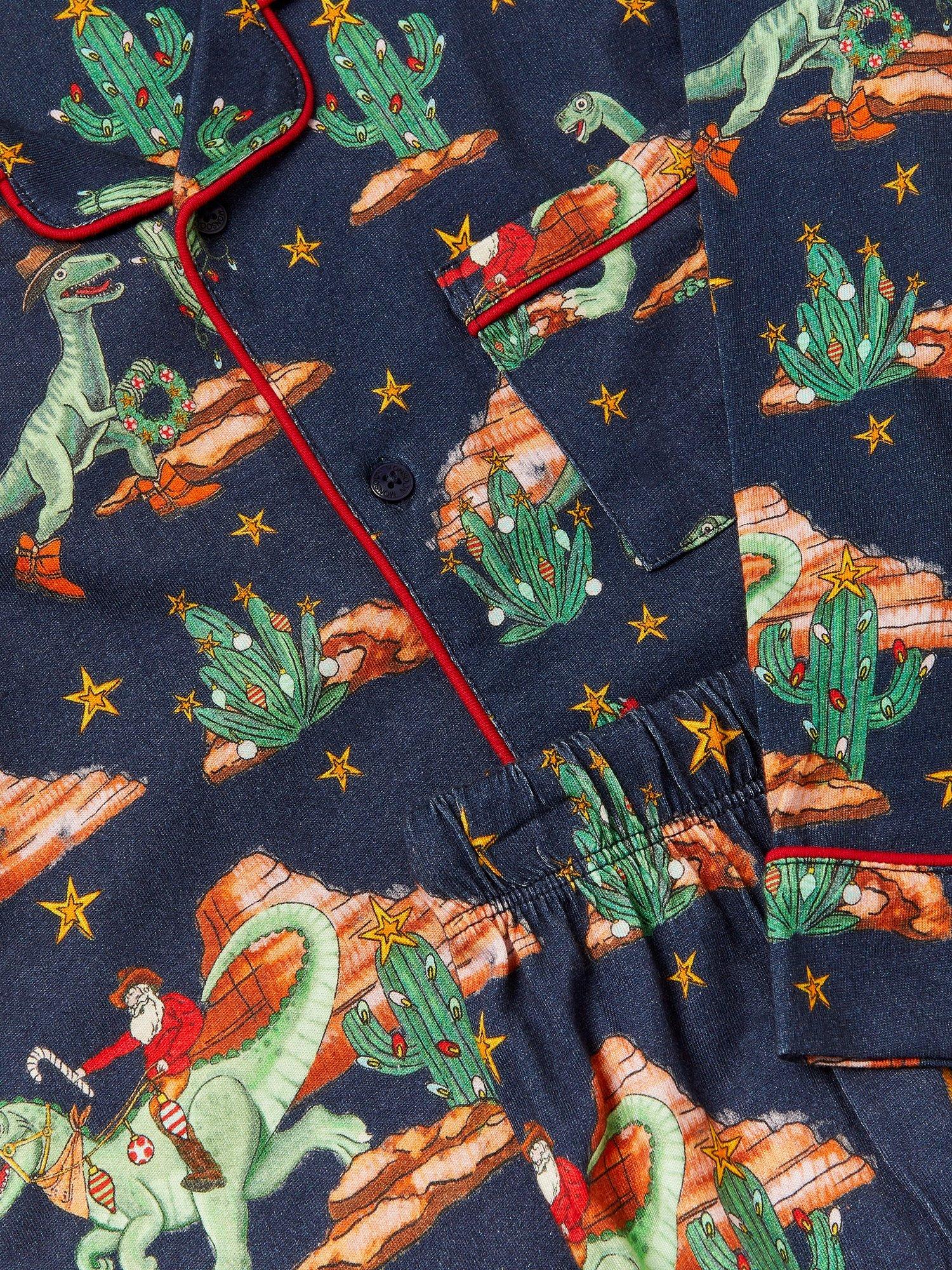 Product image 3 of 4, which shows Monsoon Kids' Chrismas Dinosaur Pyjamas, Navy, 7-8 years