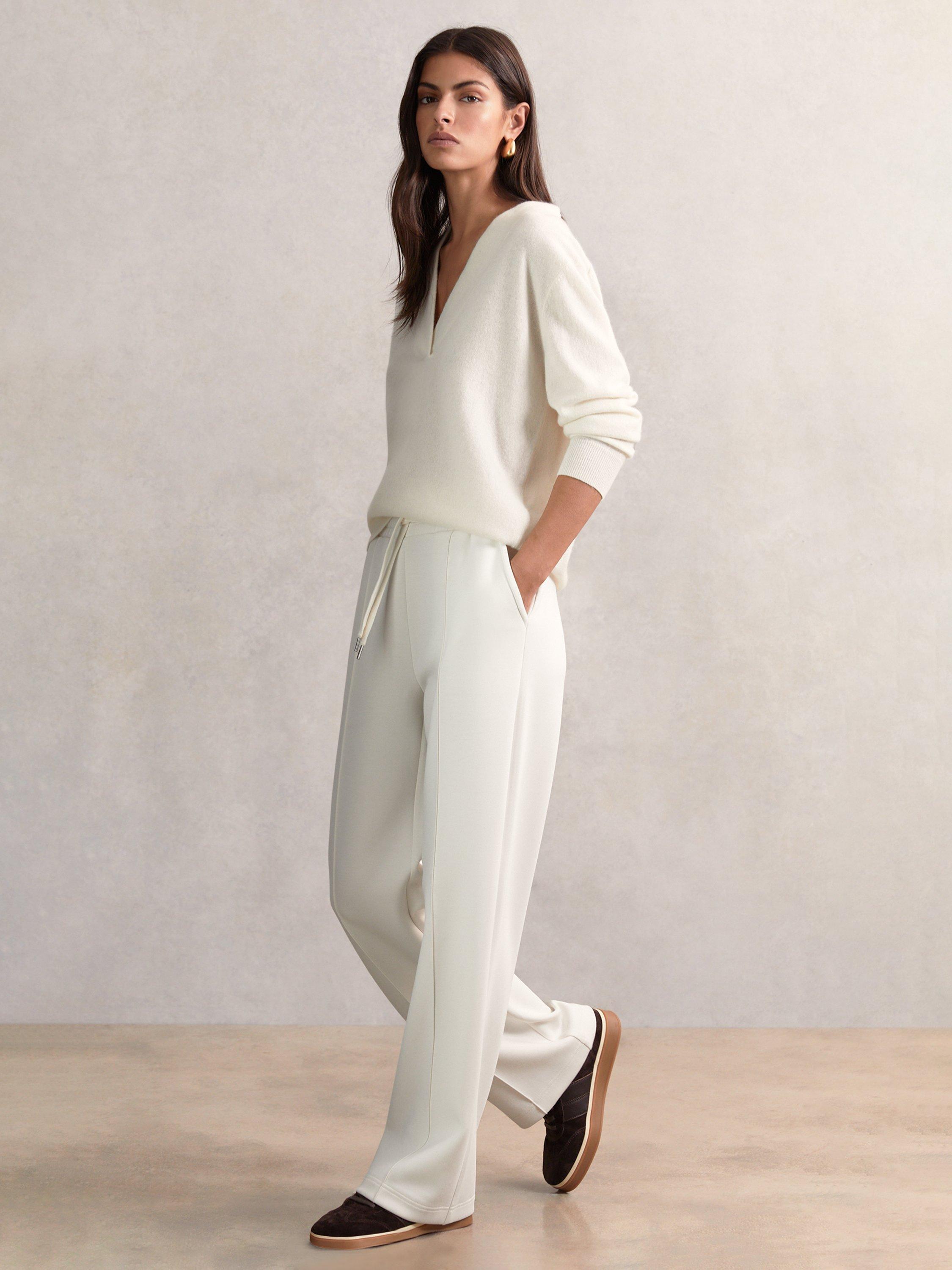 Product image 1 of 5, which shows Reiss Jemma Tailored Joggers, Ivory, XS