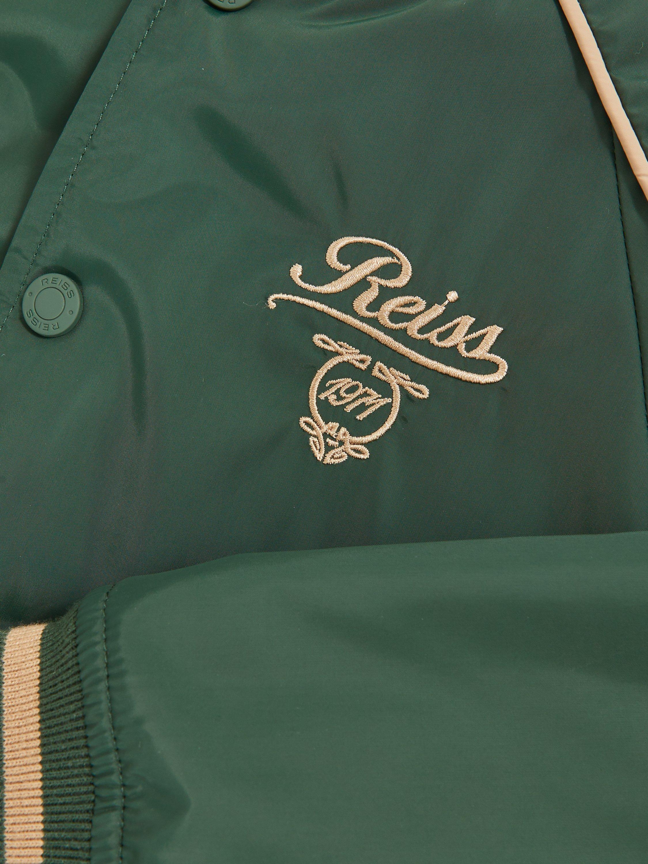 Product image 4 of 4, which shows Reiss Kids' Harvey Bomber Jacket, Forest Green/Off White, 10-11 years