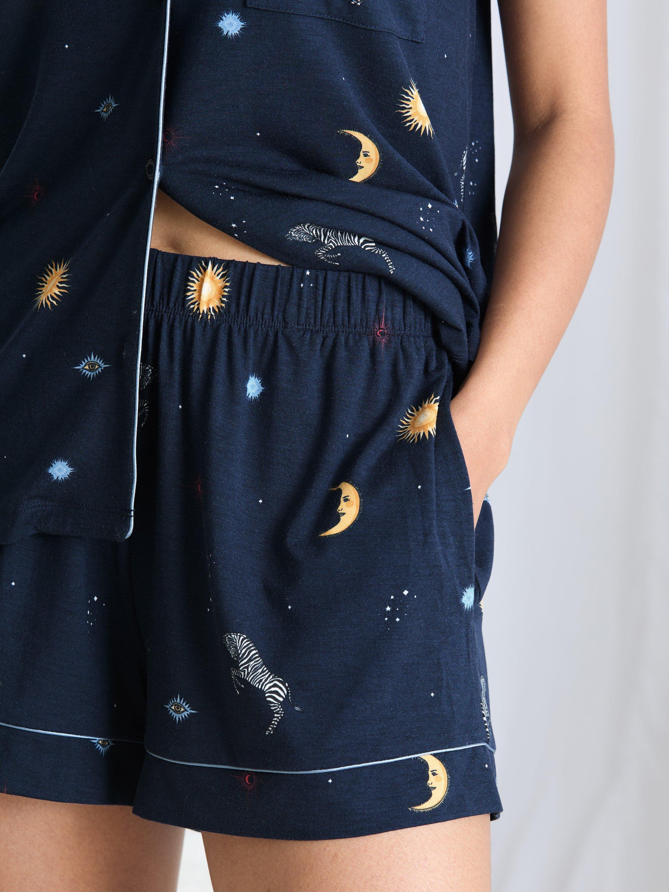 Product image 5 of 6, which shows Chelsea Peers Celestial Zebra Button Through Short Pyjama Set containing TENCEL™ Modal, Navy, 10