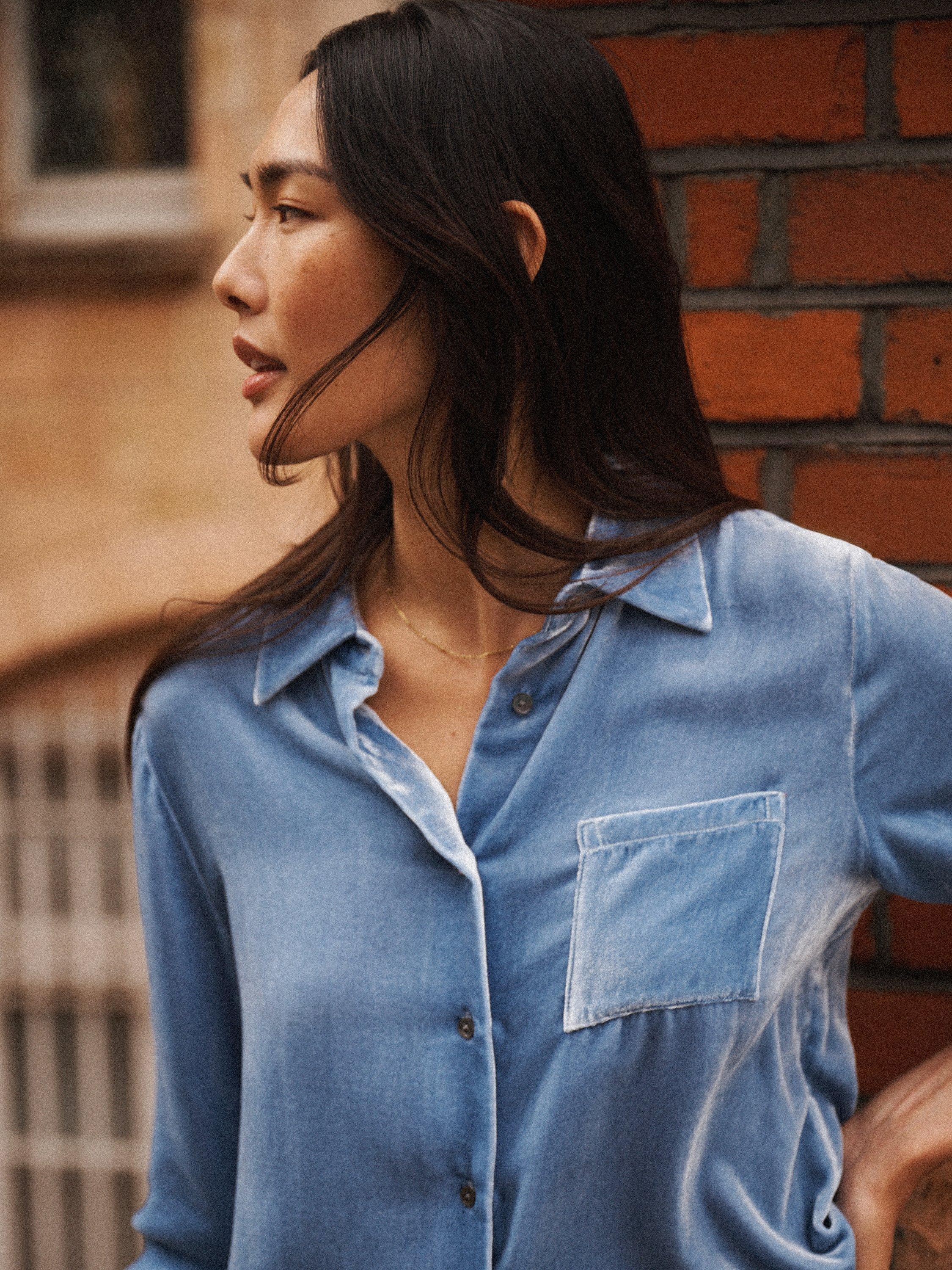 Product image 4 of 8, which shows NRBY Chiara Silk Blend Long Sleeve Collar Blouse, Chambray, XS