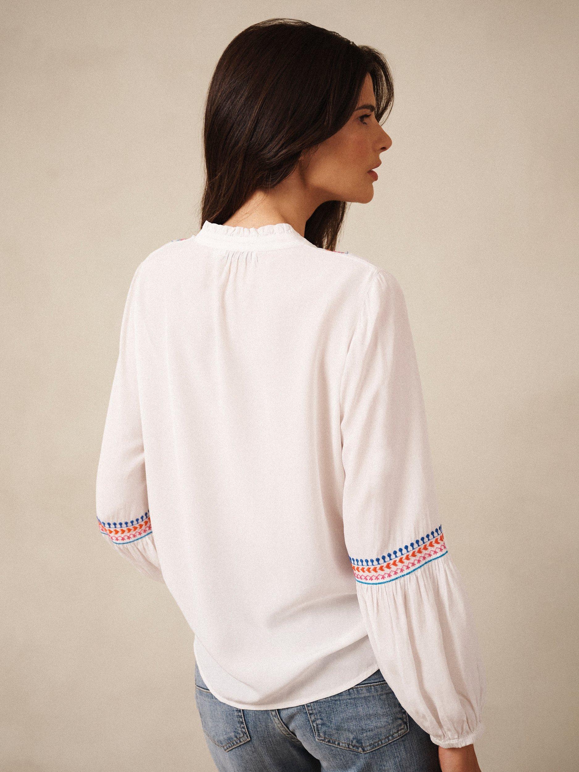 Product image 3 of 8, which shows NRBY Vaila Embroidered Long Sleeve V Neck Blouse, White, XS