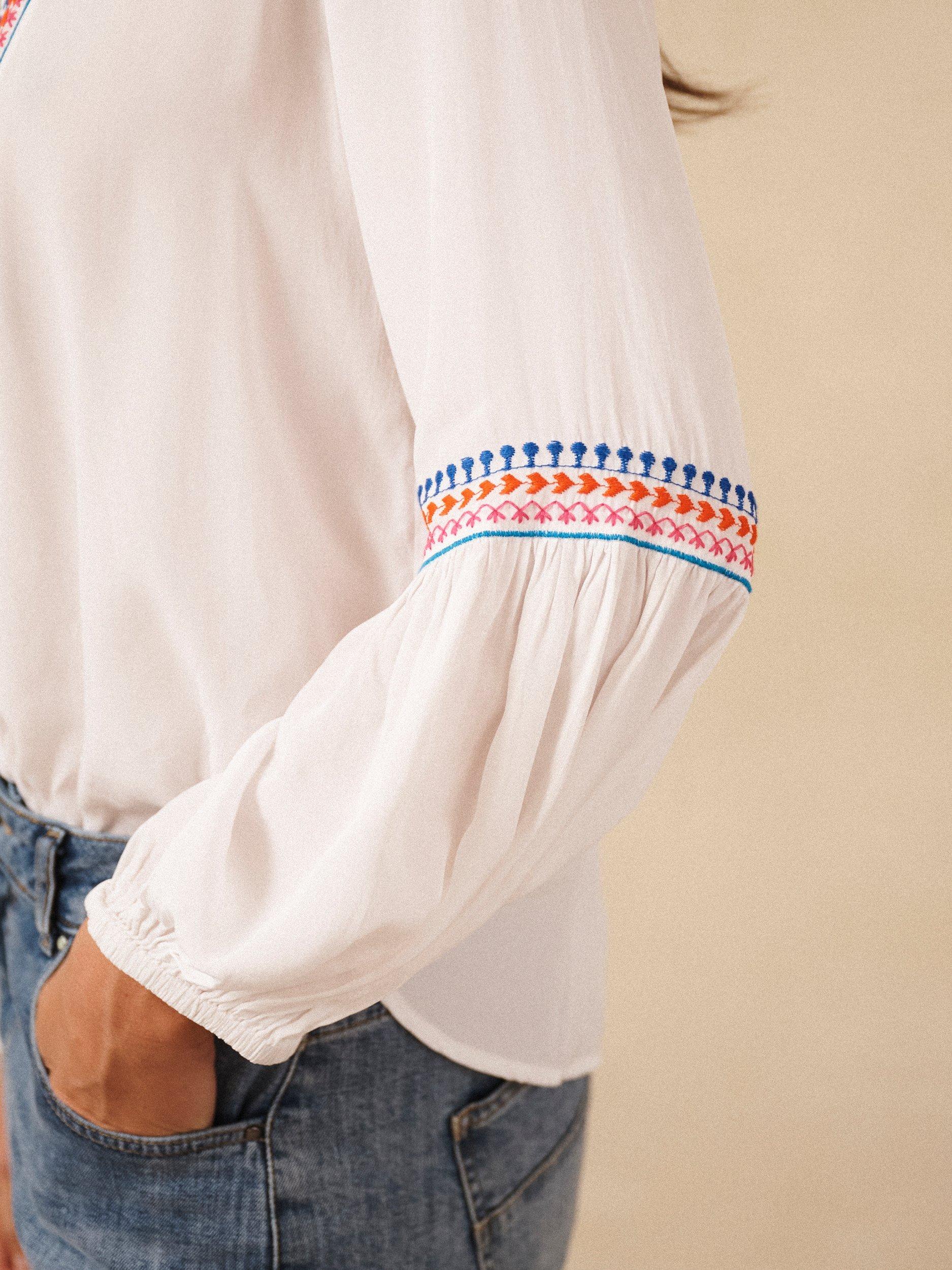 Product image 5 of 8, which shows NRBY Vaila Embroidered Long Sleeve V Neck Blouse, White, XS