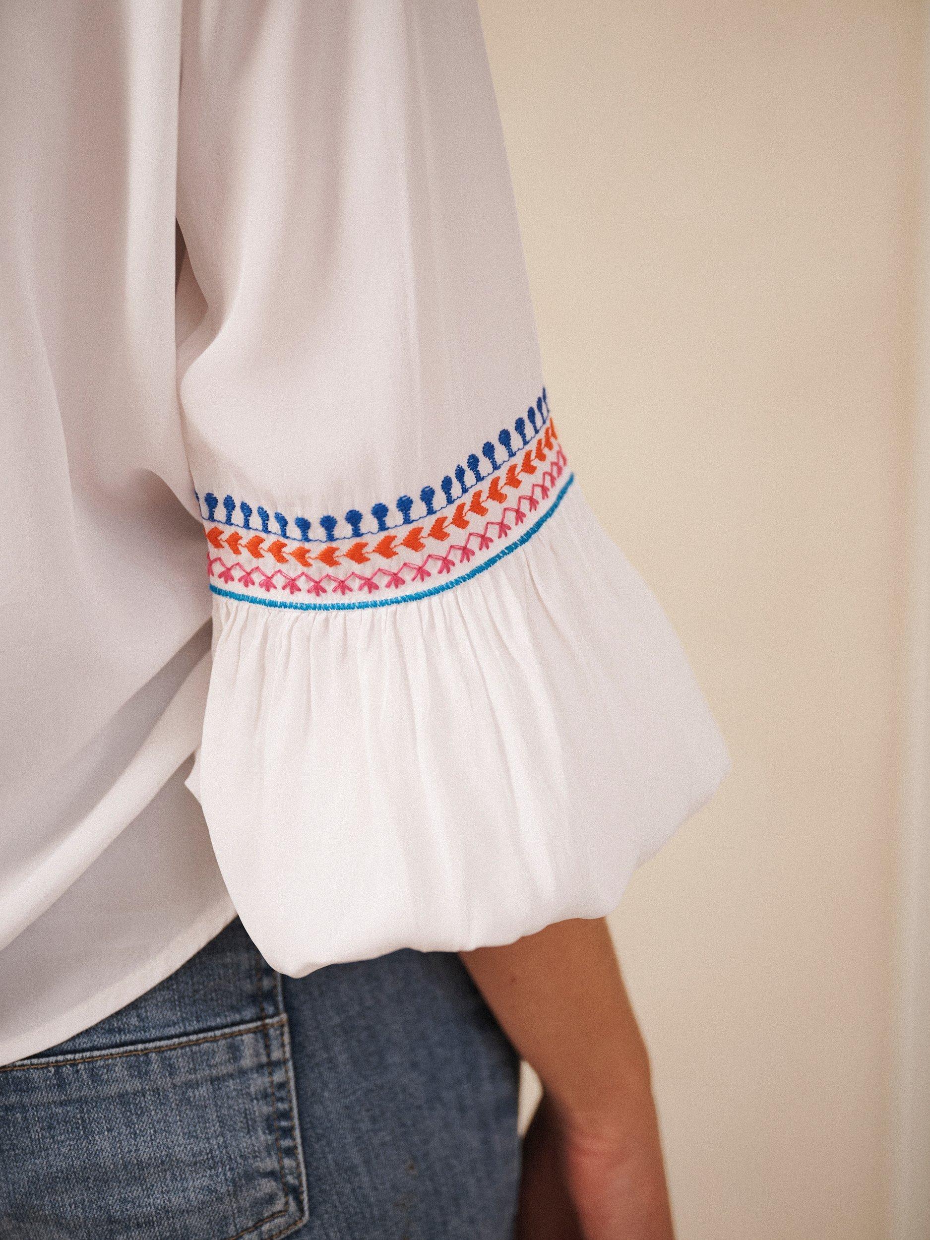 Product image 8 of 8, which shows NRBY Vaila Embroidered Long Sleeve V Neck Blouse, White, XS