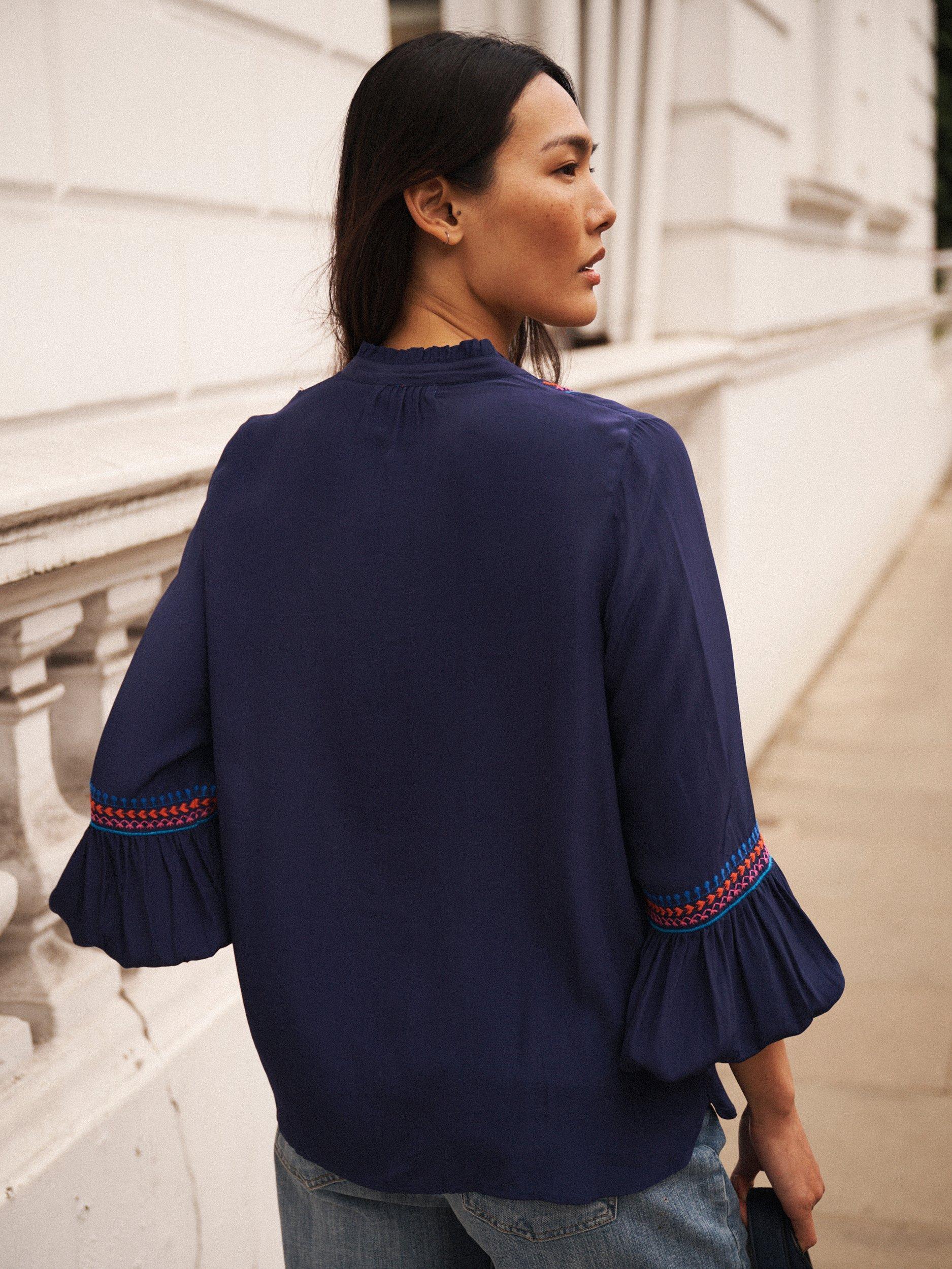 Product image 3 of 8, which shows NRBY Vaila Embroidered Long Sleeve V Neck Blouse, Navy, XS