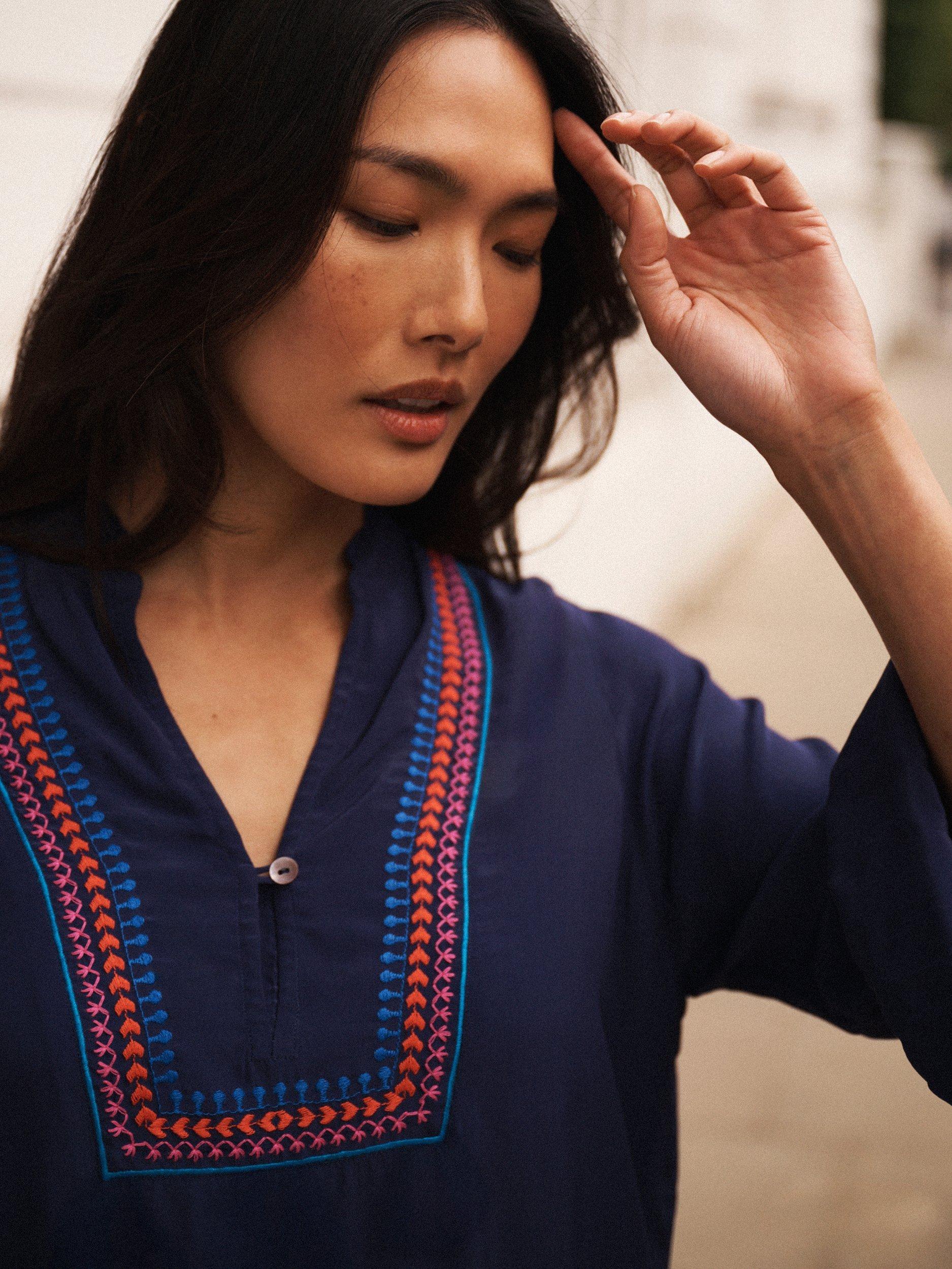 Product image 4 of 8, which shows NRBY Vaila Embroidered Long Sleeve V Neck Blouse, Navy, XS