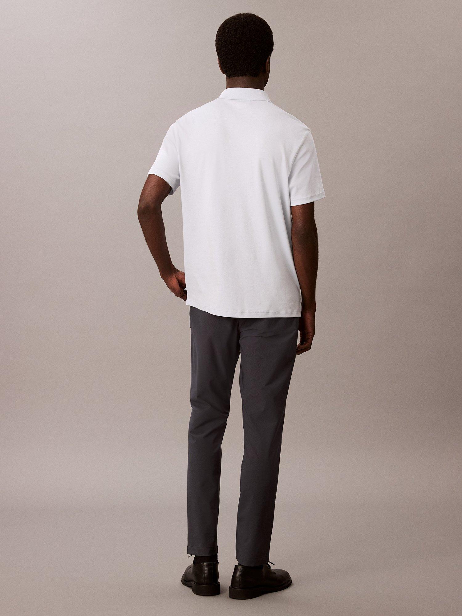 Product image 2 of 6, which shows Calvin Klein Slim Tech Stretch Trousers, India Ink, 29R