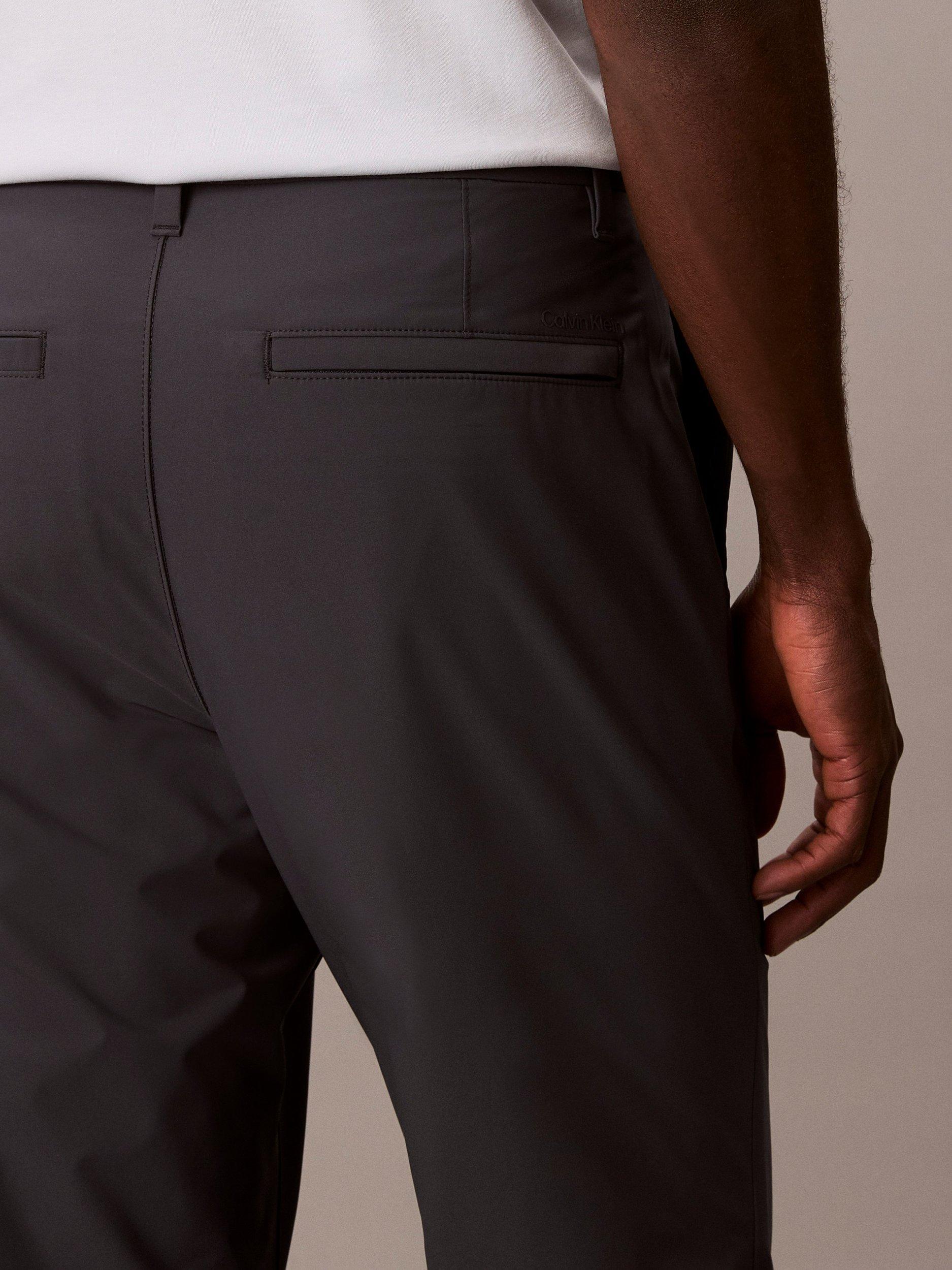 Product image 5 of 6, which shows Calvin Klein Slim Tech Stretch Trousers, India Ink, 29R