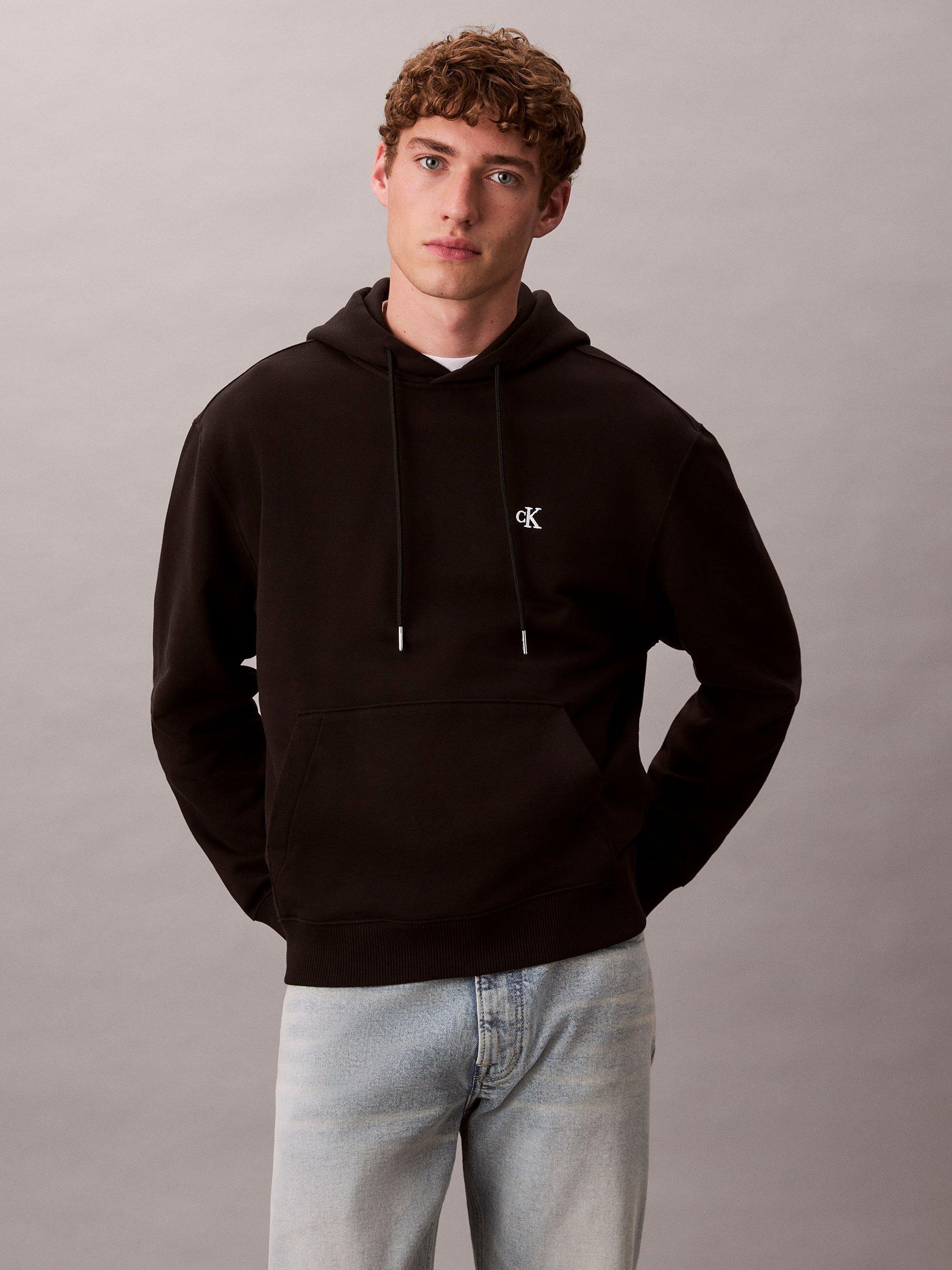 Product image 1 of 5, which shows Calvin Klein Monogram Hoodie, Black, XS