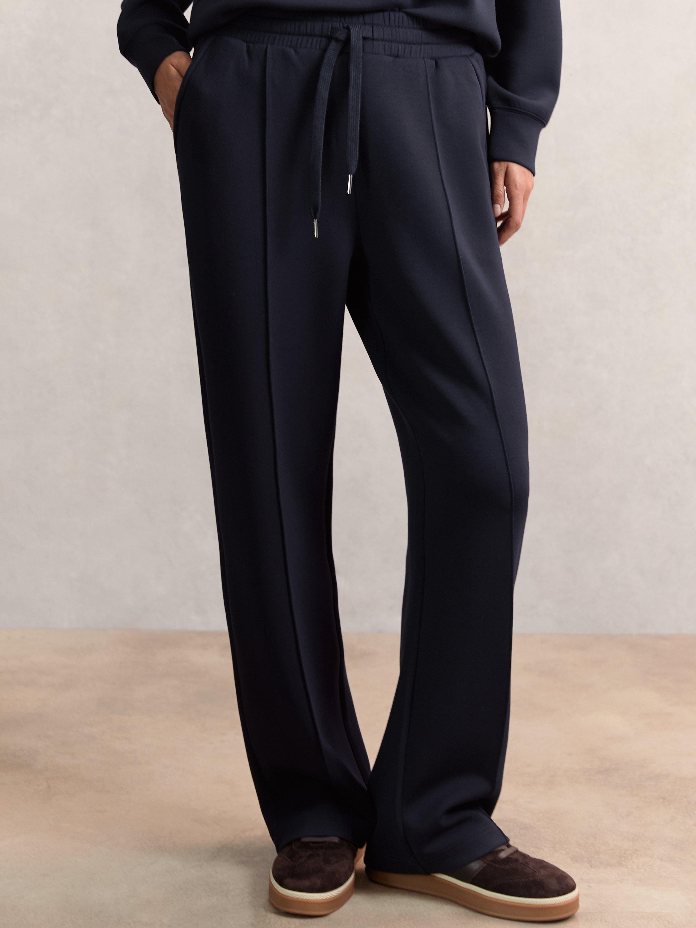 Product image 4 of 5, which shows Reiss Jemma Drawstring Wide Leg Joggers, Navy, XS