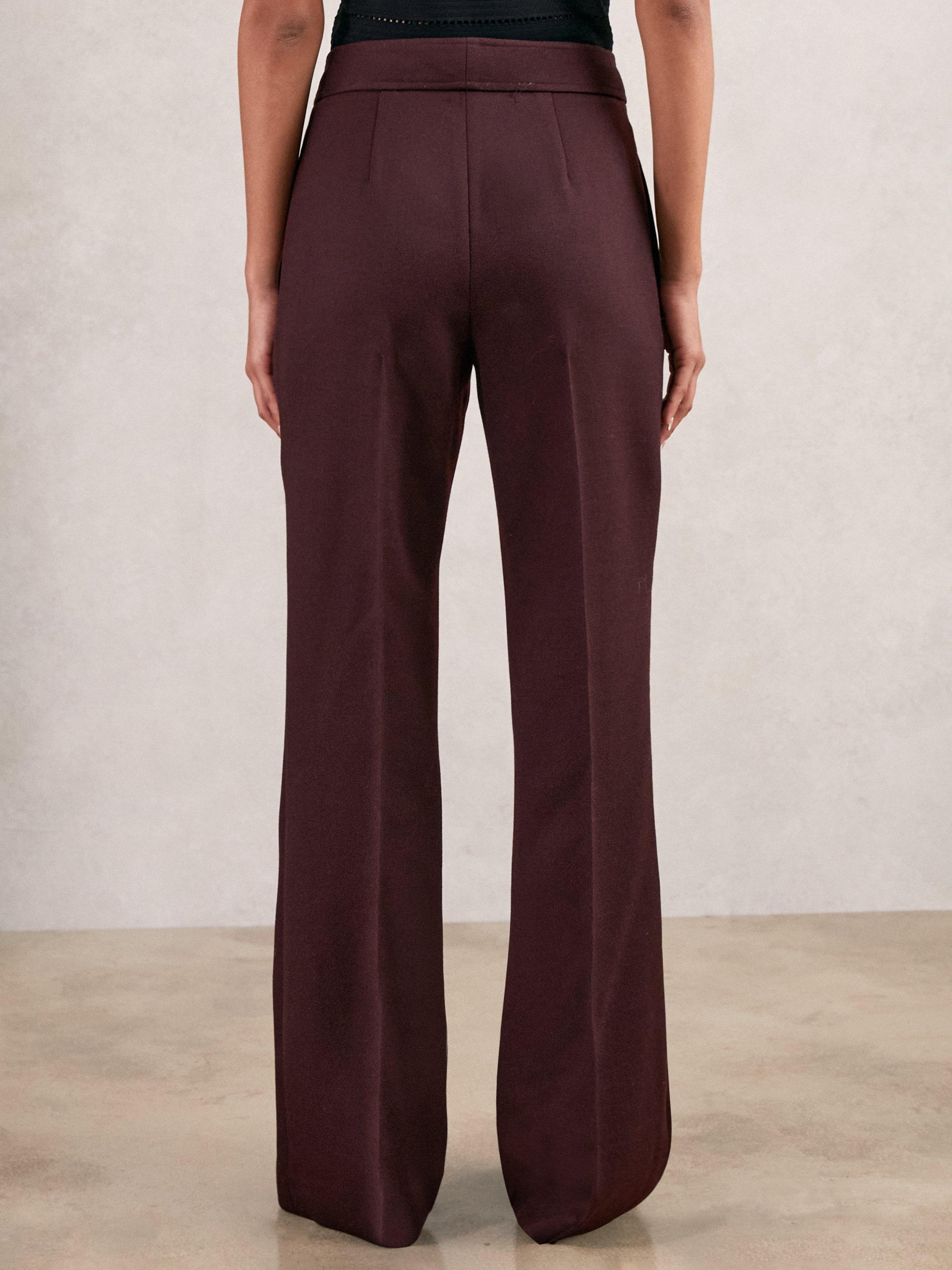 Product image 2 of 5, which shows Reiss Petite Lily Flared Wool Blend Trousers, Burgundy, 16Pt