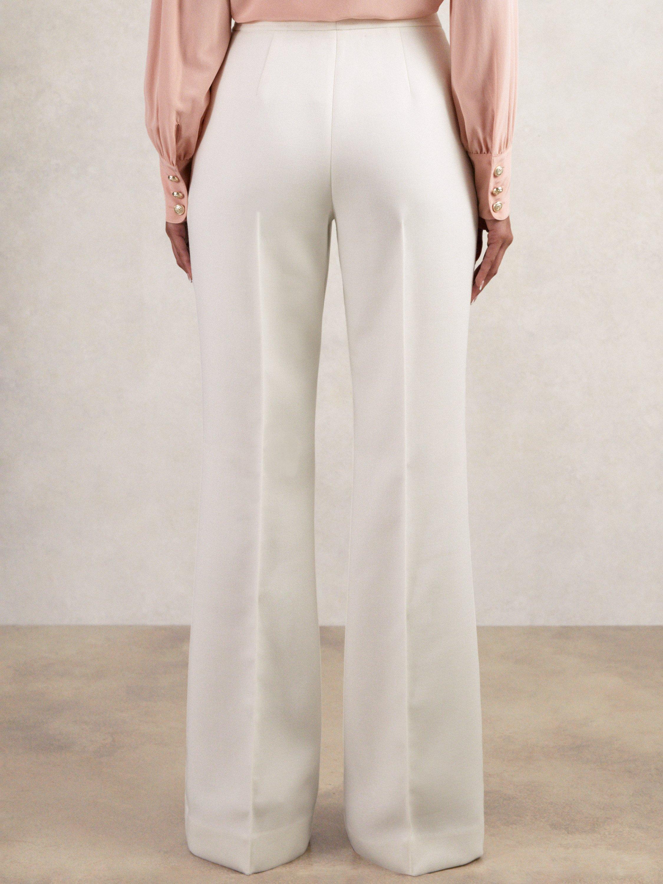 Product image 2 of 5, which shows Reiss Petite Lily Flared Wool Blend Trousers, White, 10Pt