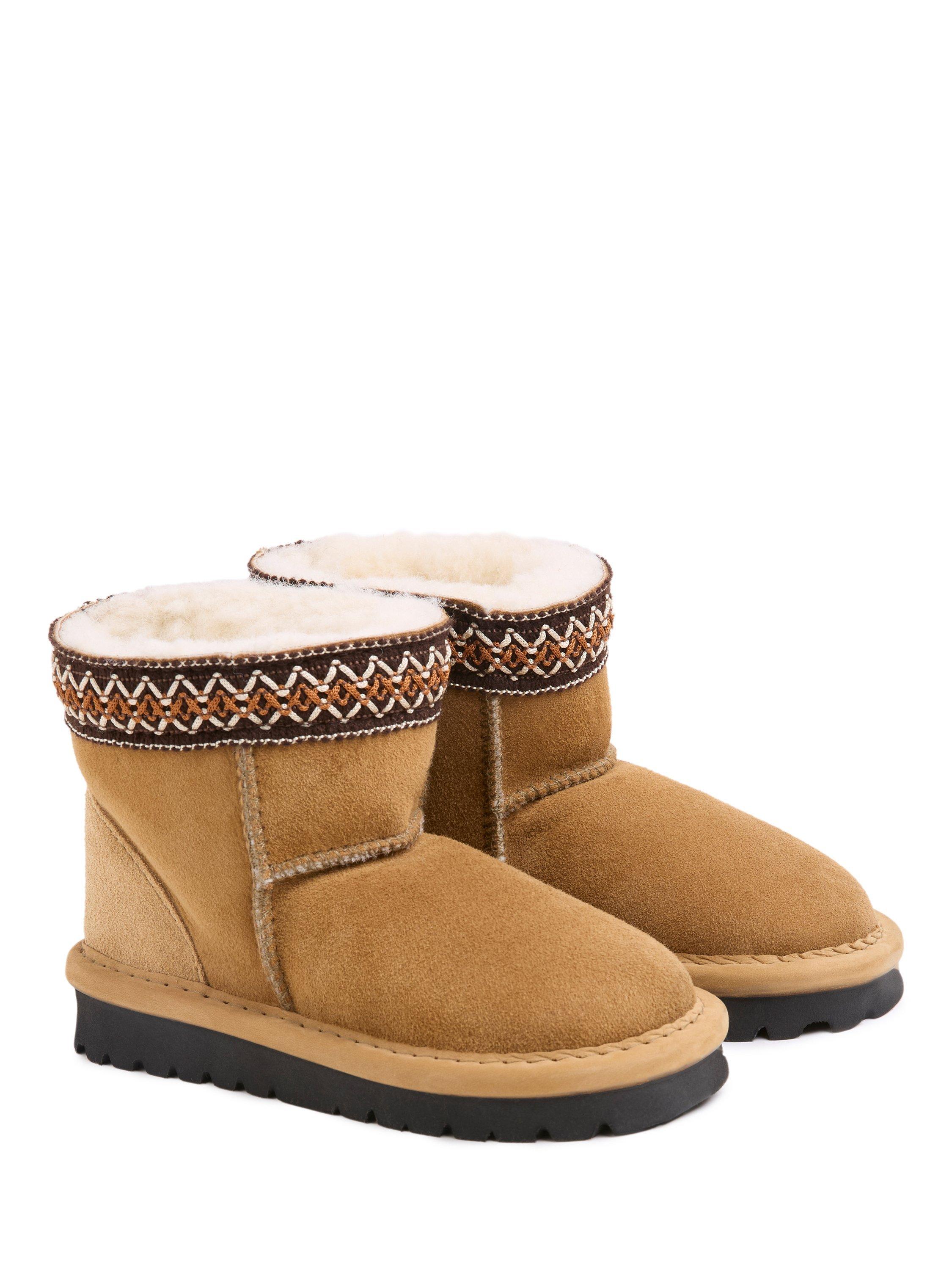 Product image 2 of 6, which shows Celtic & Co. Kids' Sheepskin Braid Trim Slipper Boots, Spice, 5-6 years