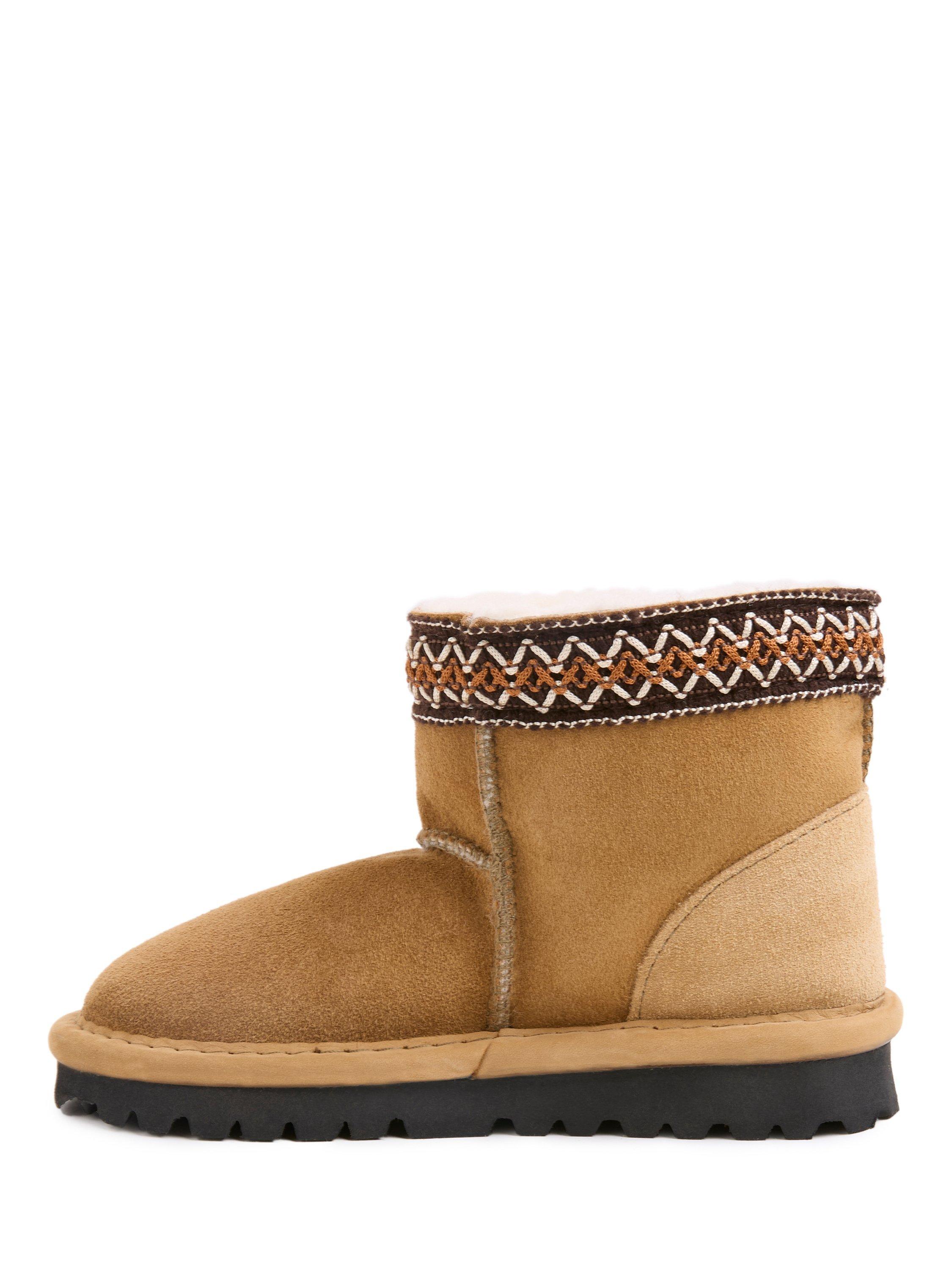 Product image 3 of 6, which shows Celtic & Co. Kids' Sheepskin Braid Trim Slipper Boots, Spice, 5-6 years