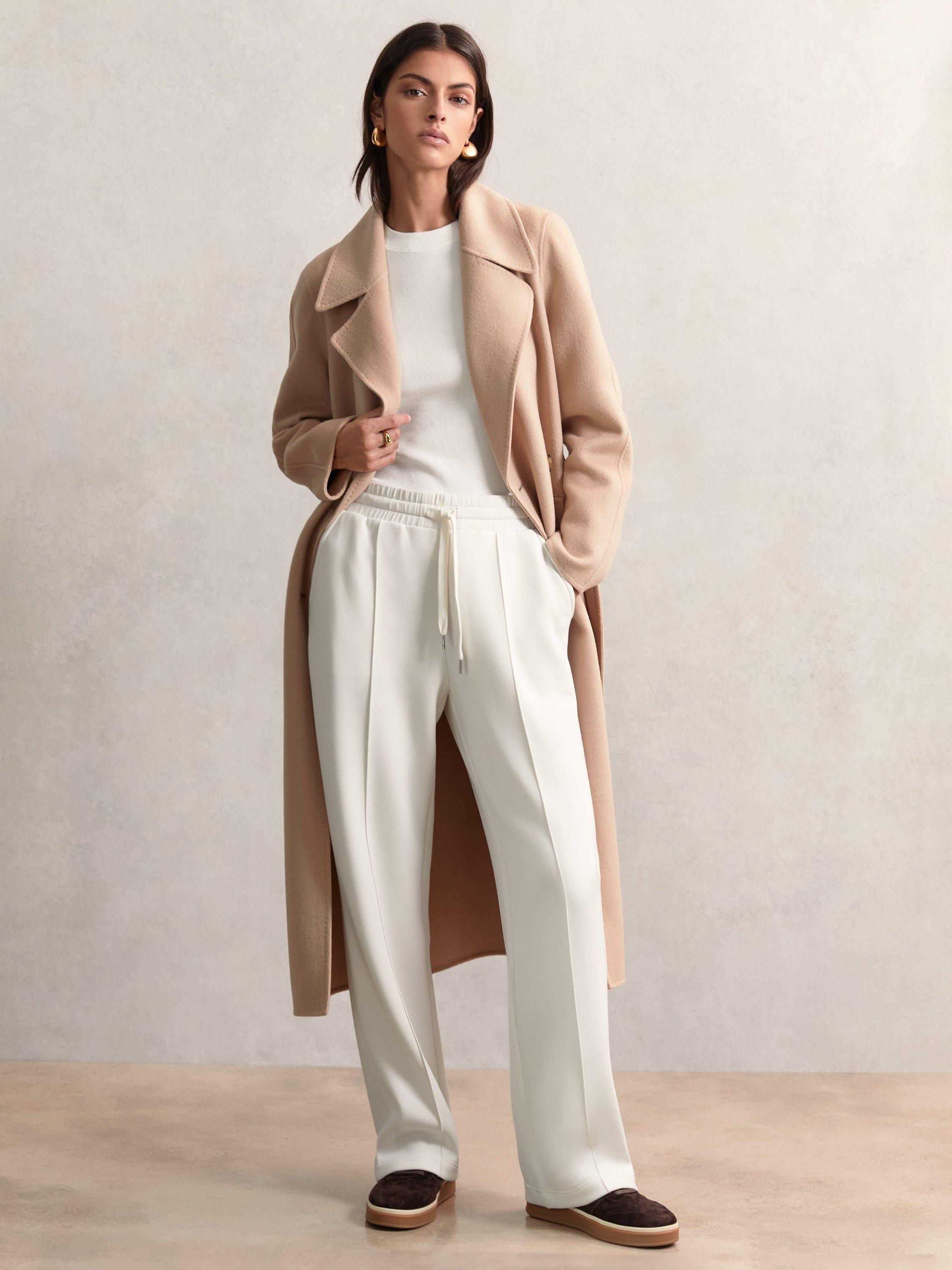 Product image 1 of 5, which shows Reiss Petite Wide Leg Tailored Joggers, Ivory, XS
