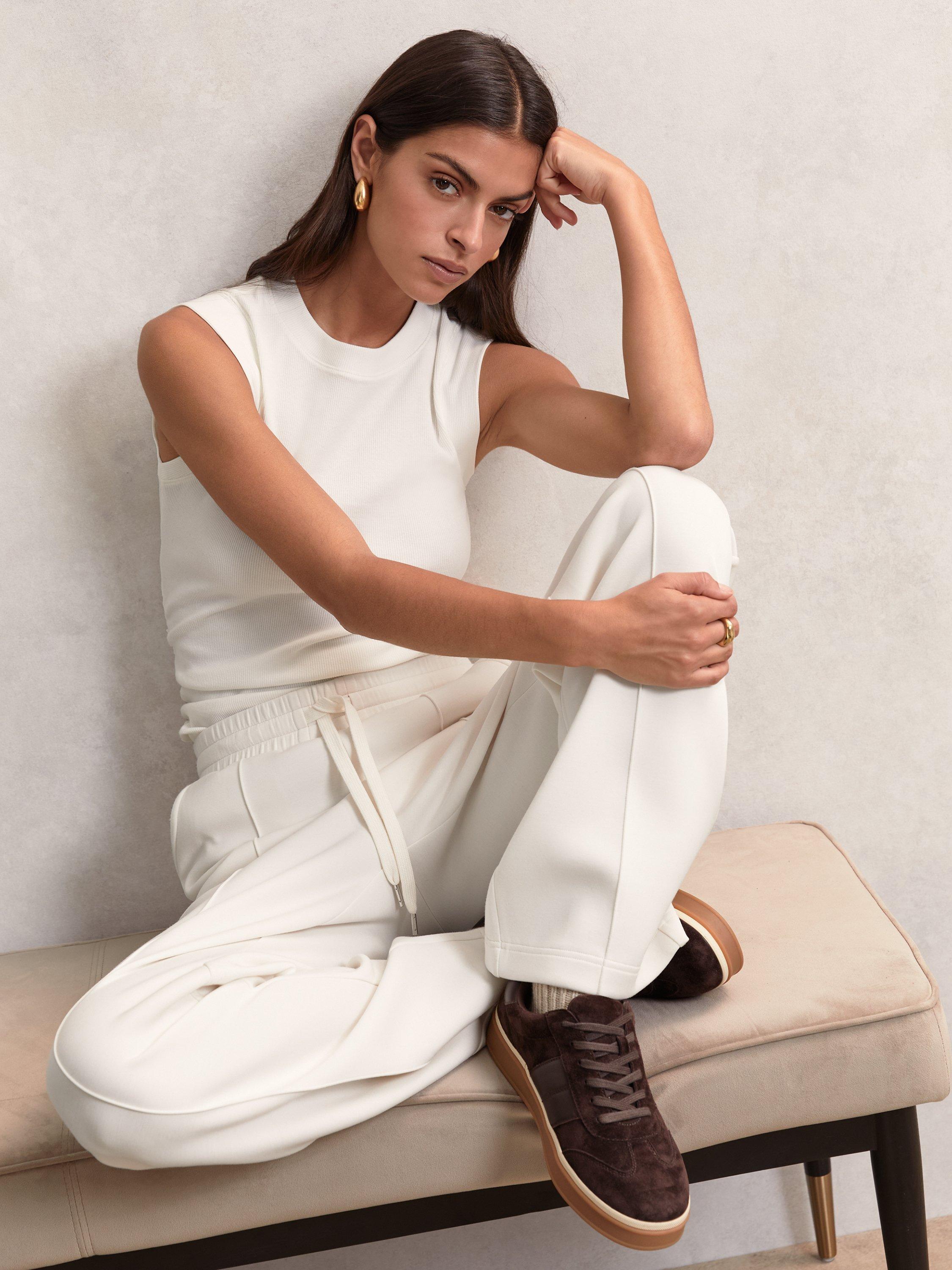 Product image 4 of 5, which shows Reiss Petite Wide Leg Tailored Joggers, Ivory, XS