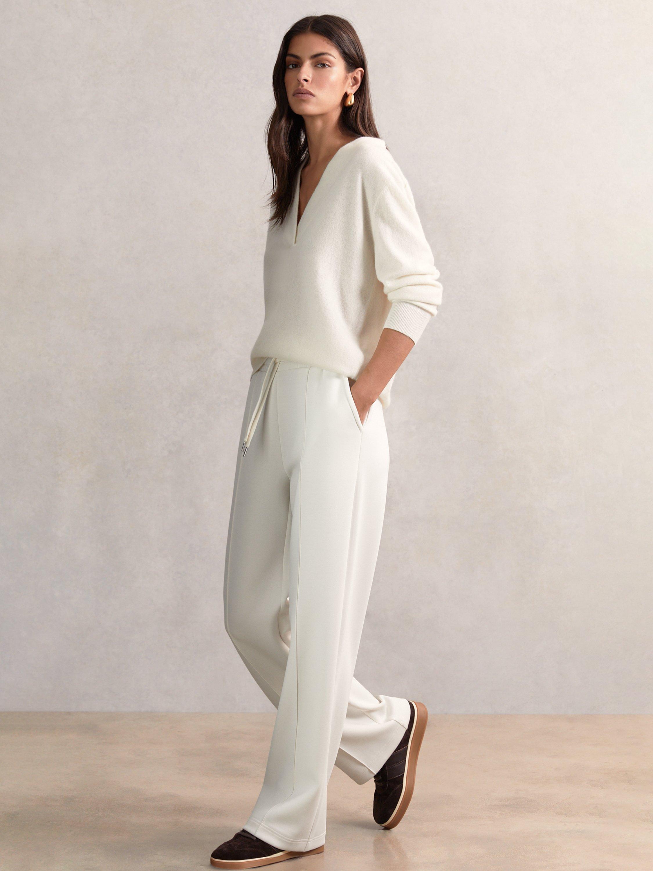 Product image 5 of 5, which shows Reiss Petite Wide Leg Tailored Joggers, Ivory, XS