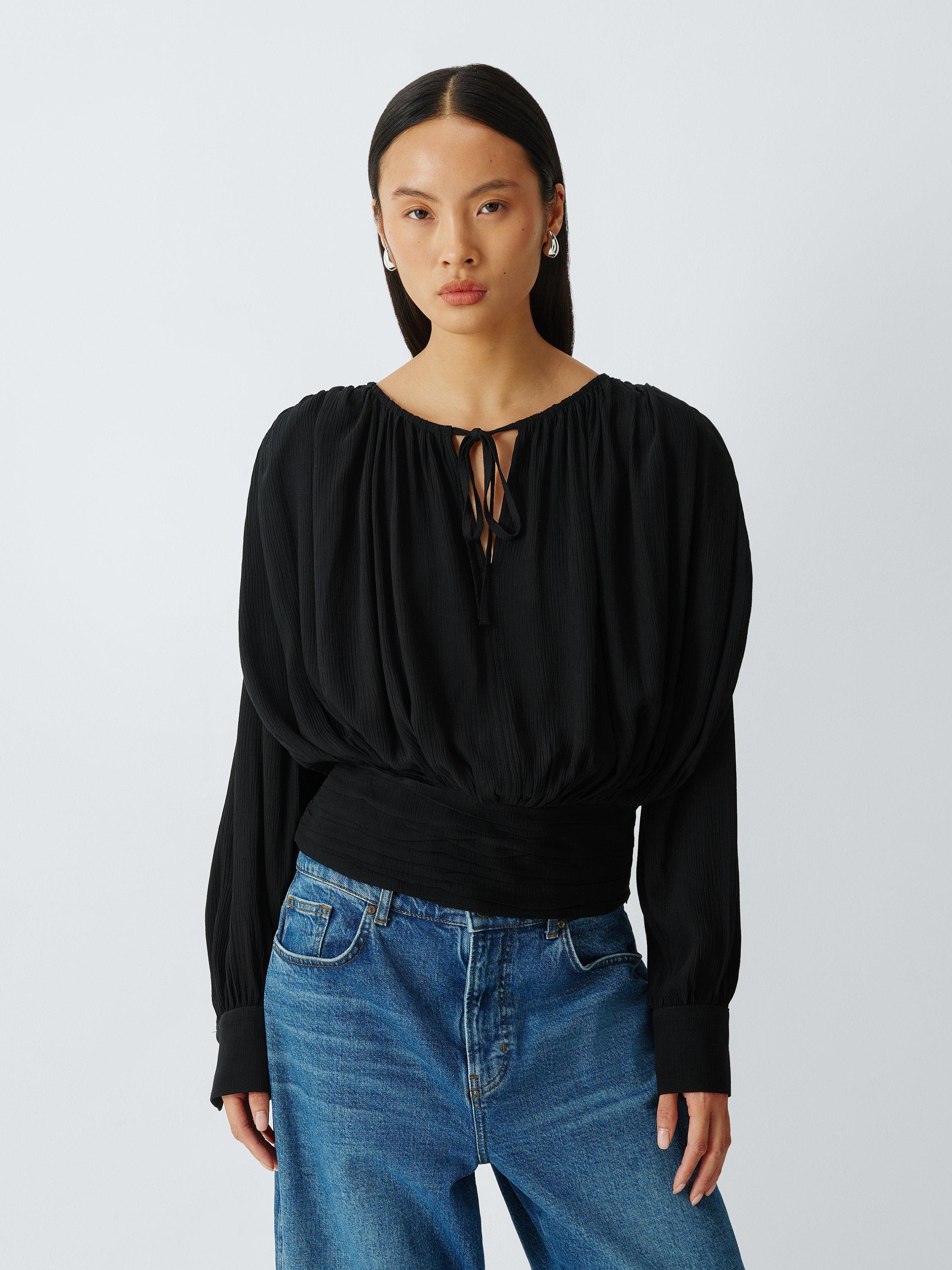 Product image 1 of 8, which shows AND/OR Textured Tie Neck Top, Black, 6
