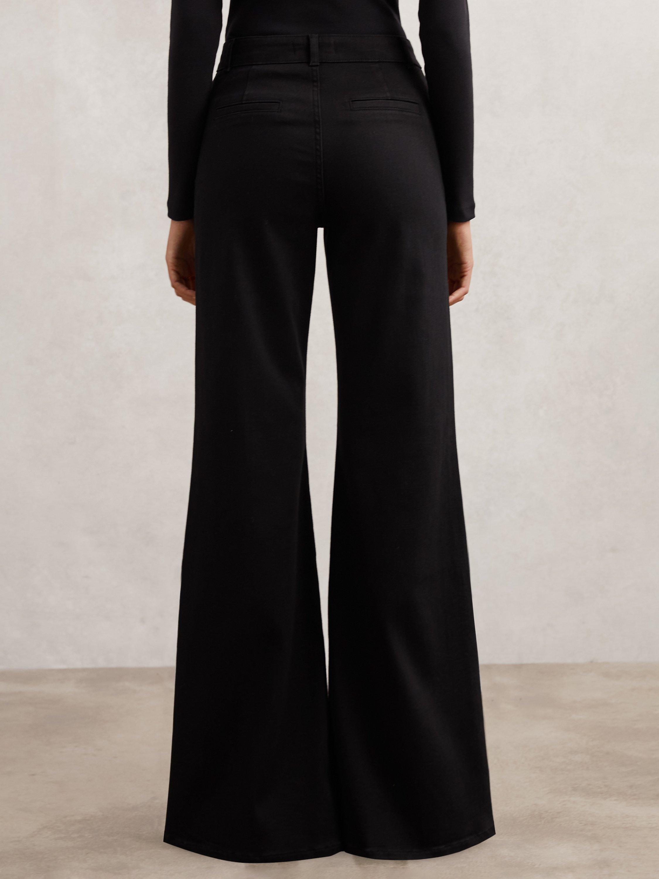Product image 2 of 5, which shows Reiss Petite Ria Button Detail Flared Jeans, Black, 26Pt