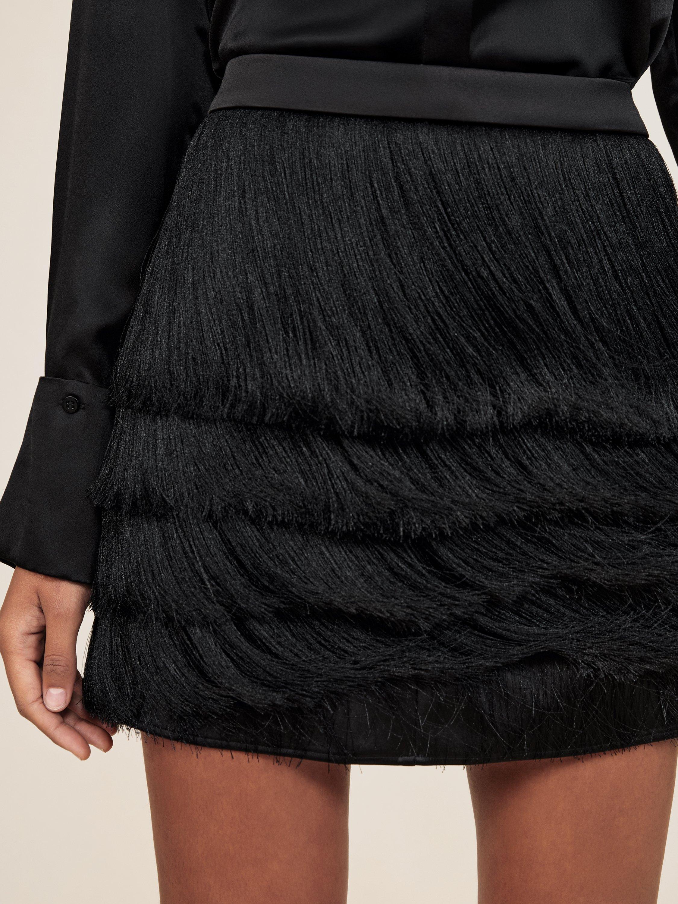 Product image 4 of 5, which shows Reiss Chloe Tiered A-Line Mini Skirt , Black, 10