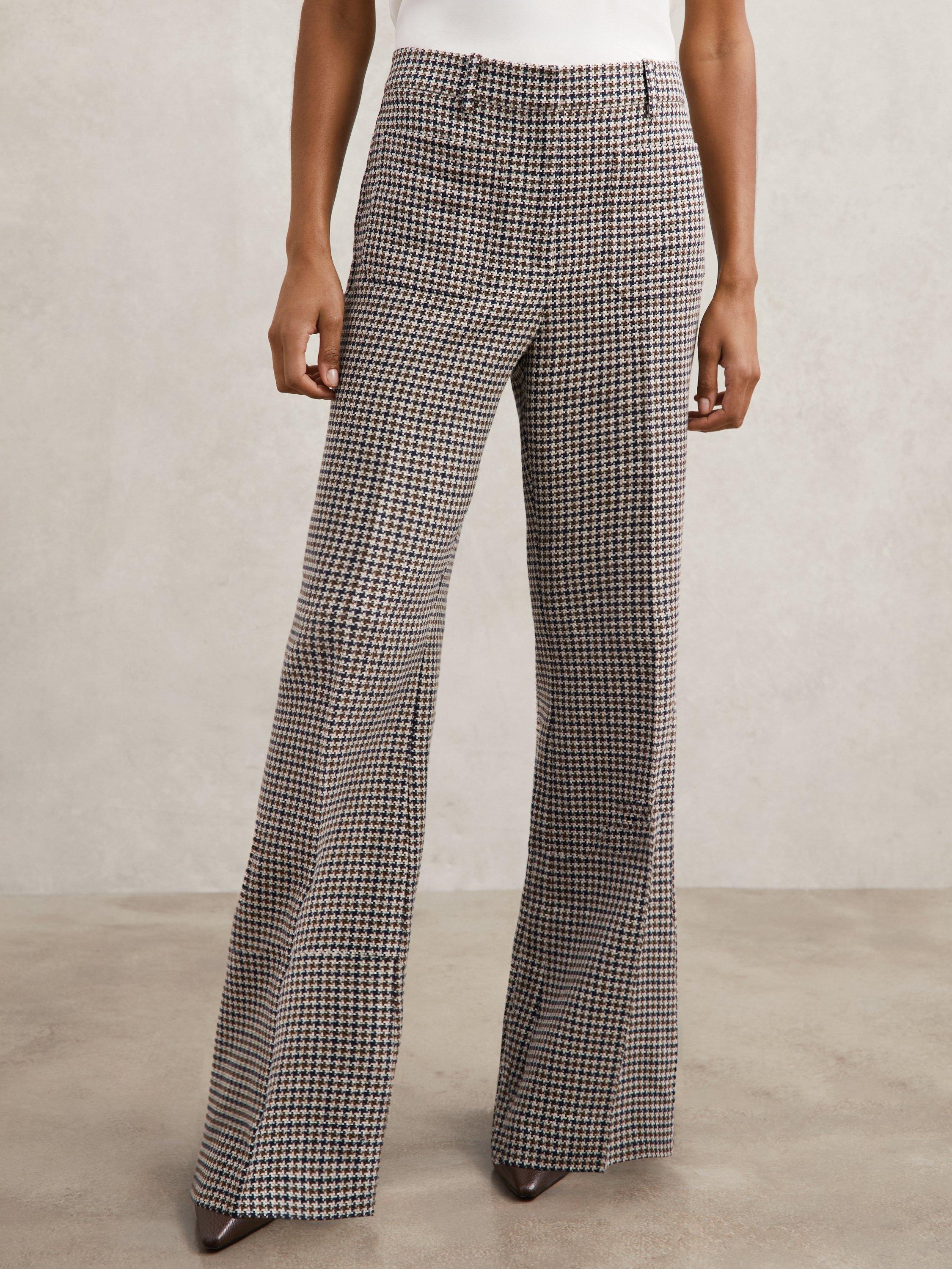 Product image 2 of 5, which shows Reiss Check Print Flare Leg Trousers, Navy/Neutral, 6R