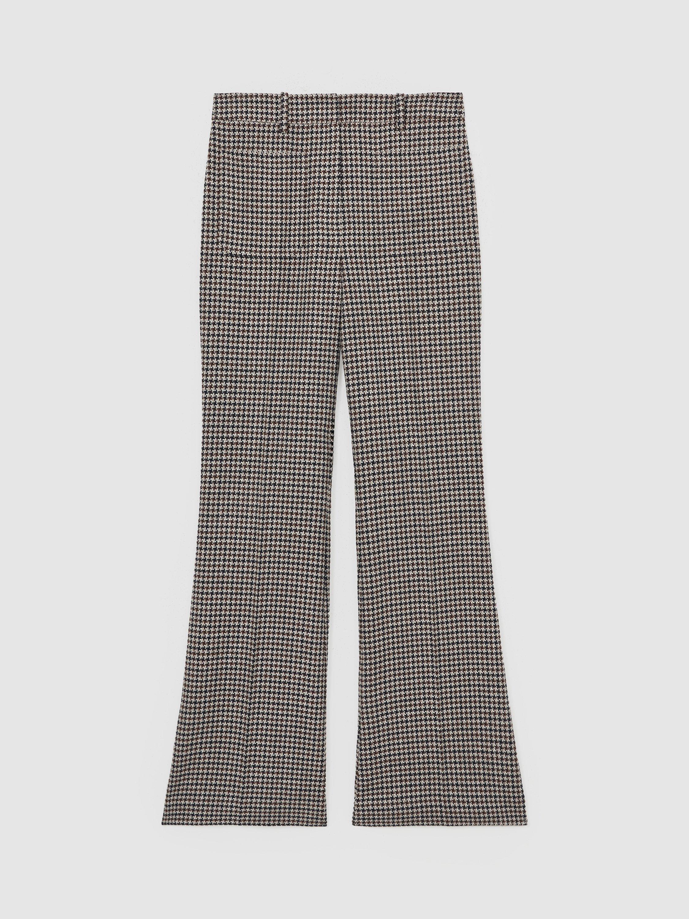Product image 3 of 5, which shows Reiss Check Print Flare Leg Trousers, Navy/Neutral, 6R