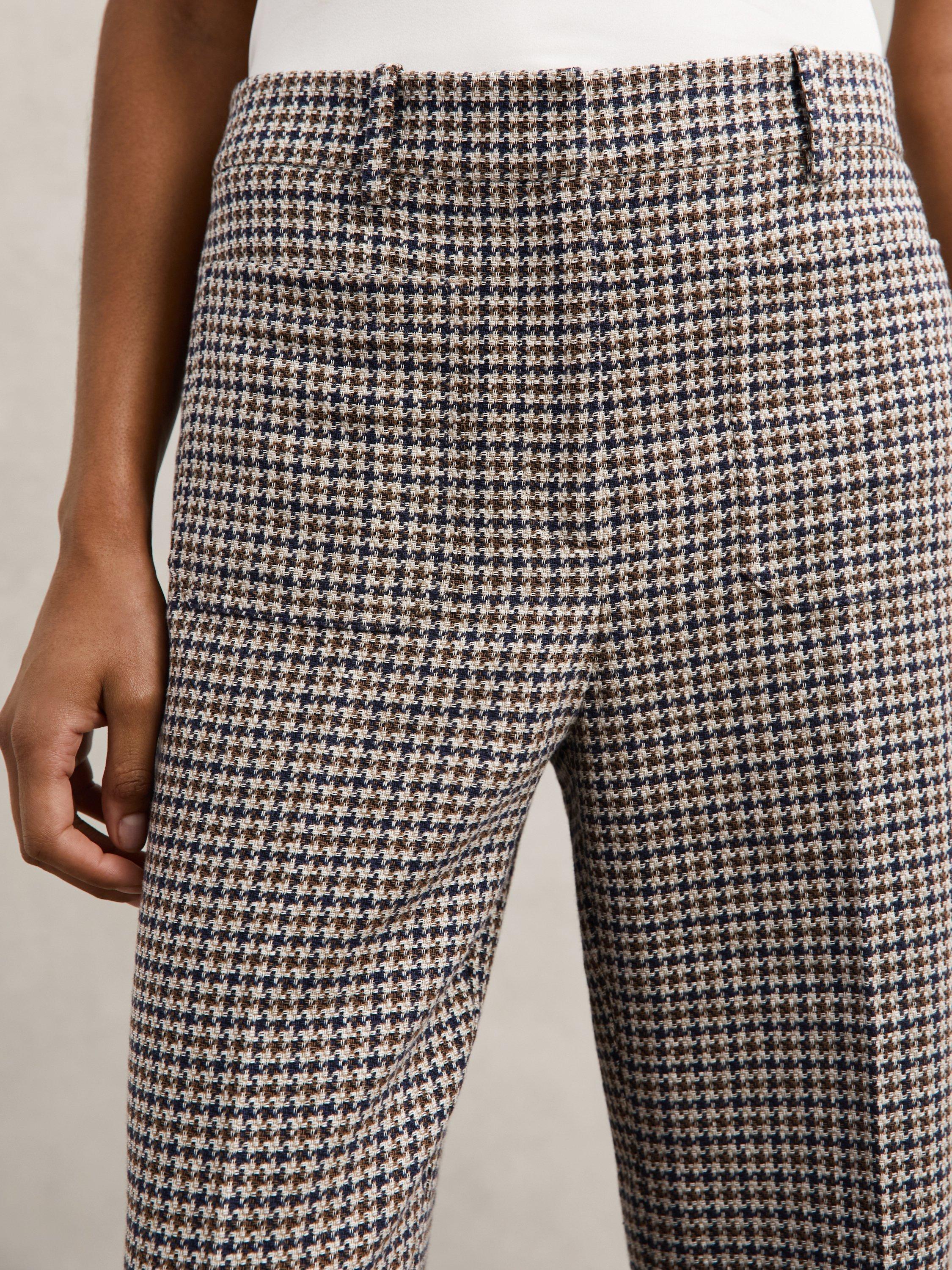 Product image 4 of 5, which shows Reiss Check Print Flare Leg Trousers, Navy/Neutral, 6R