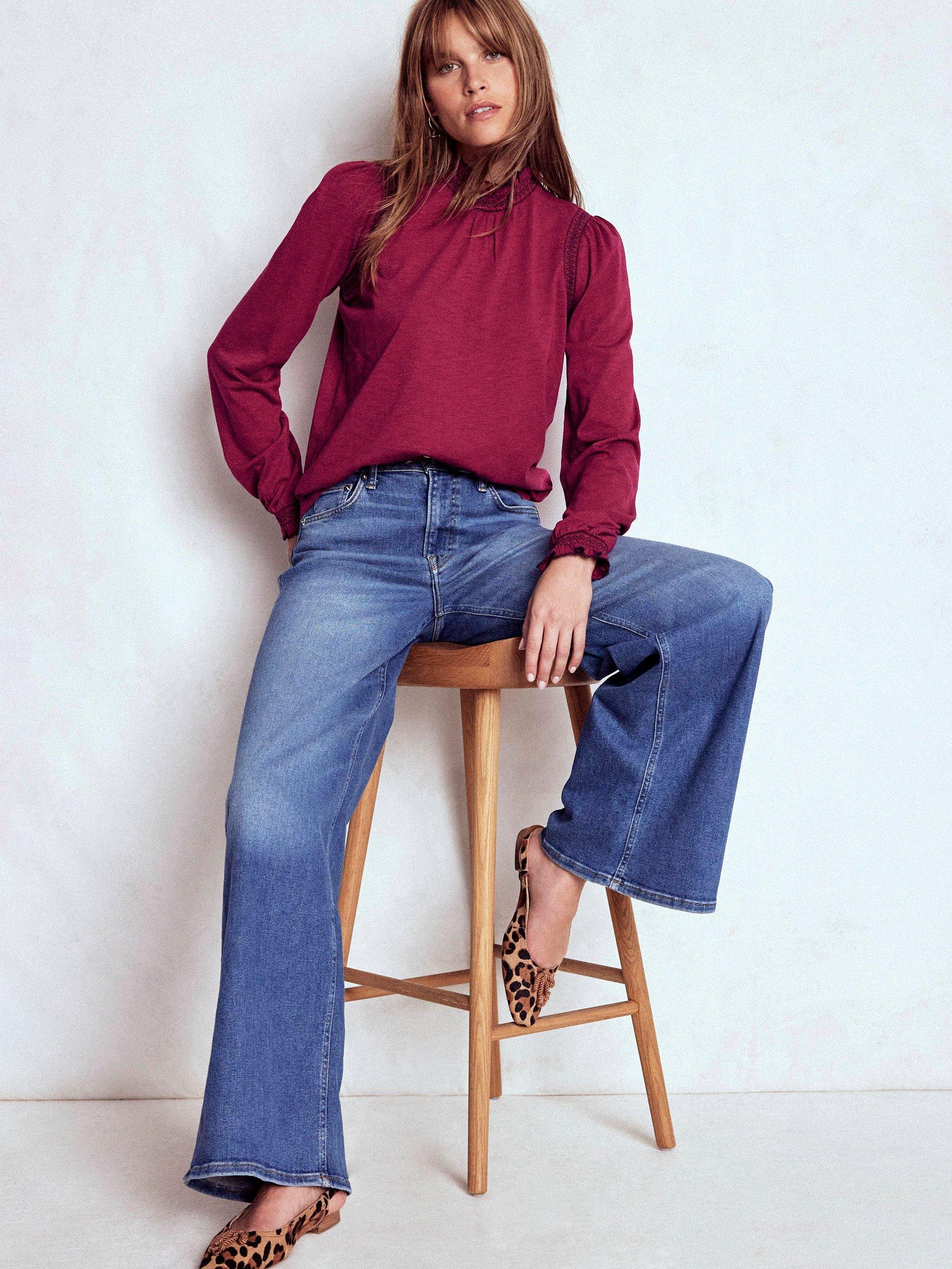 Product image 2 of 5, which shows Boden Tia Long Sleeve High Neck Jersey Top, Ruby Red, 8