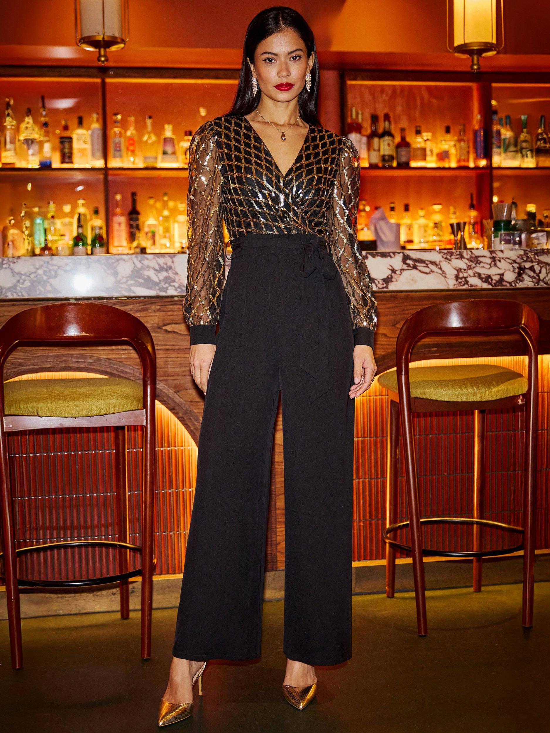 Product image 1 of 5, which shows Yumi Sequin Wrap Over V-Neck Tailored Jumpsuit, Black, 8