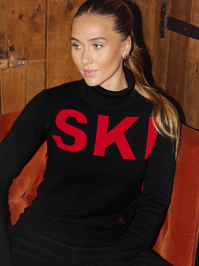Product image 3 of 8, which shows The Little Tailor Slim Roll Neck Ski Text Jumper, Black/Red, XS